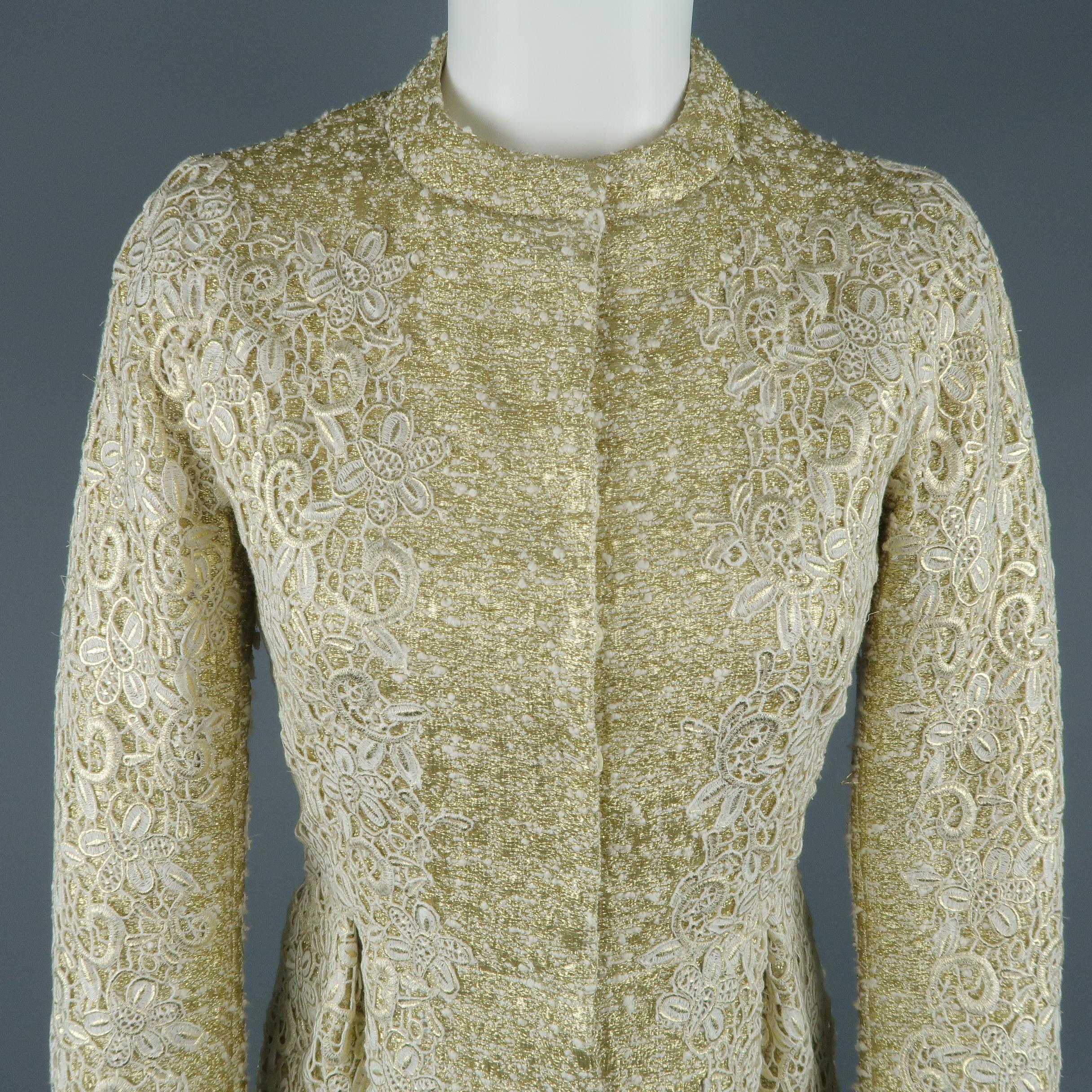 GIAMBATTISTA VALLI cocktail dress comes in a thick metallic gold tweed with a crew neck, hidden placket snap closure front, pleated pencil skirt, long sleeves, and overall cream lace overlay. Made in Italy.
 
Excellent Pre-Owned Condition.
Marked: