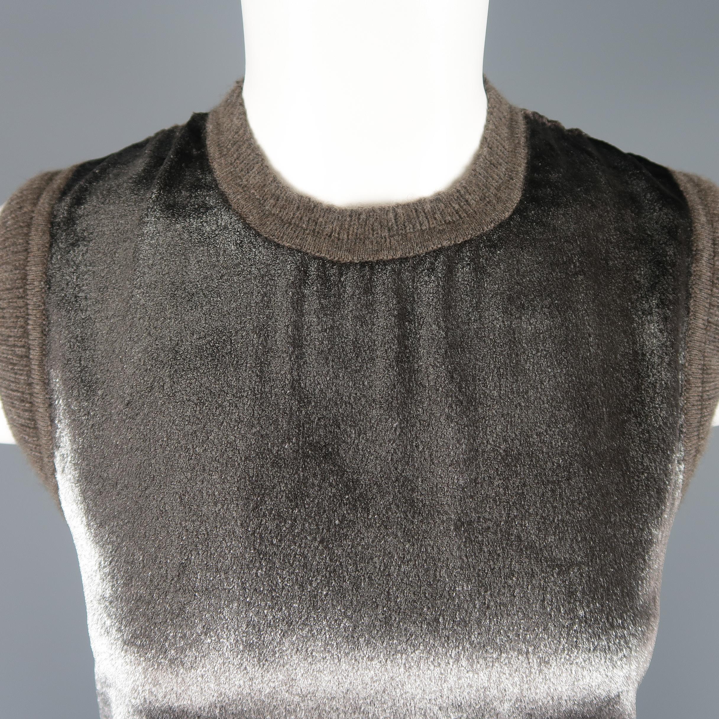 MAYET sweater vest top comes in taupe cashmere ribbed knit with a crewneck and silver metallic velvet frontal panel.
 
Excellent Pre-Owned Condition.
Marked: XS
 
Measurements:
 
Shoulder: 13.5 in.
Bust: 34 in.
Length: 22 in.