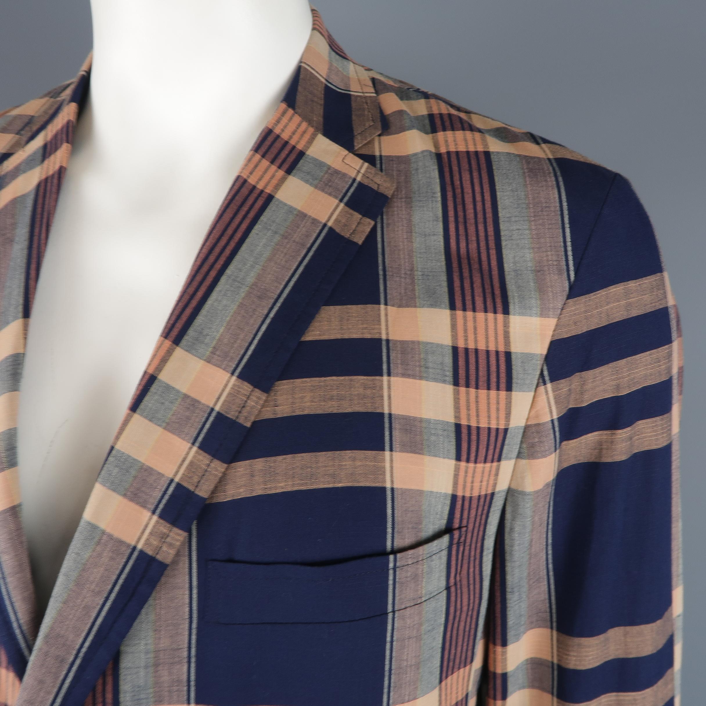Single breasted GITMAN BROS X UNIONMADE casual sport coat comes in Navy and peach plaid pattern cotton a notch lapel, two button front, and patch flap pockets. Made in USA.

New with Tags.
Marked: 44
 
Measurements:
 
Shoulder: 19 in.
Chest: 48