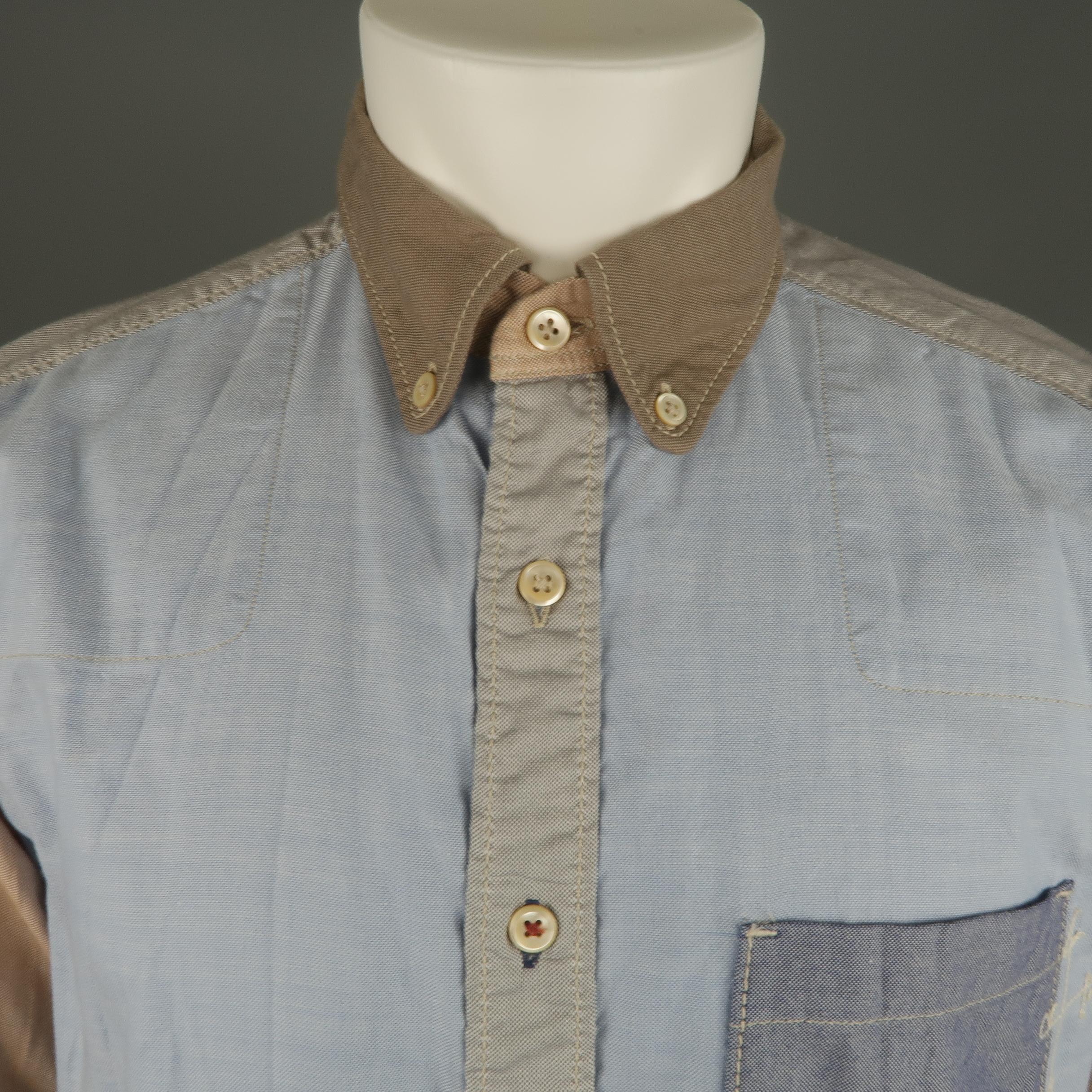 45RPM shirt comes in various color block shades of cotton Oxford material with a taupe button down collar, gray shoulders, light blue front, navy patch pocket with embroidery, and tan sleeves. Made in Japan.
 
Excellent Pre-Owned Condition.
Marked: