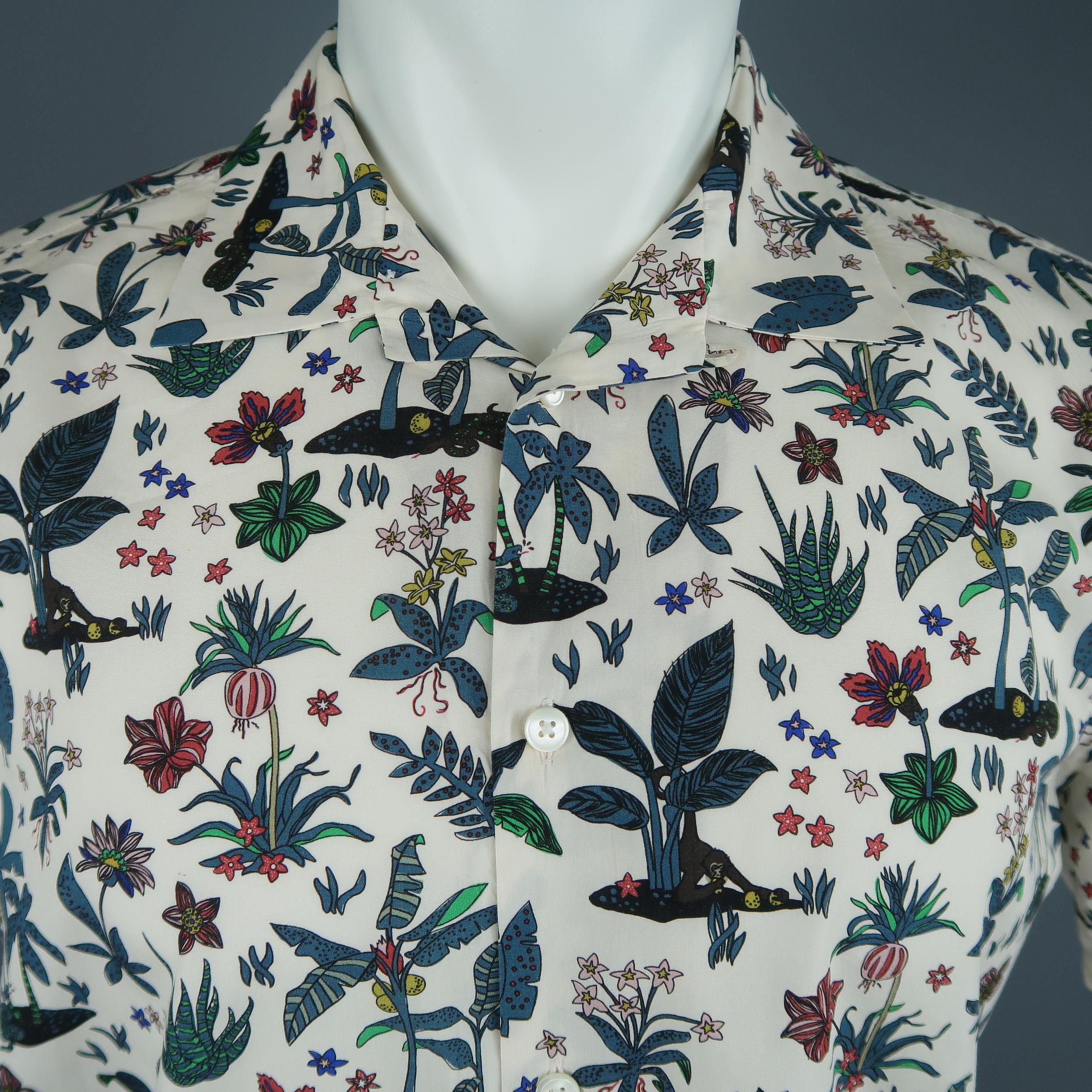 P.S. by PAUL SMITH camp shirt comes in white cotton with a monkey island Hawaiian print throughout. Made in Portugal.
 
Excellent Pre-Owned Condition.
Marked: M
 
Measurements:
 
Shoulder: 17 in.
Chest: 42 in.
Sleeve: 9 in.
Length: 28 in.