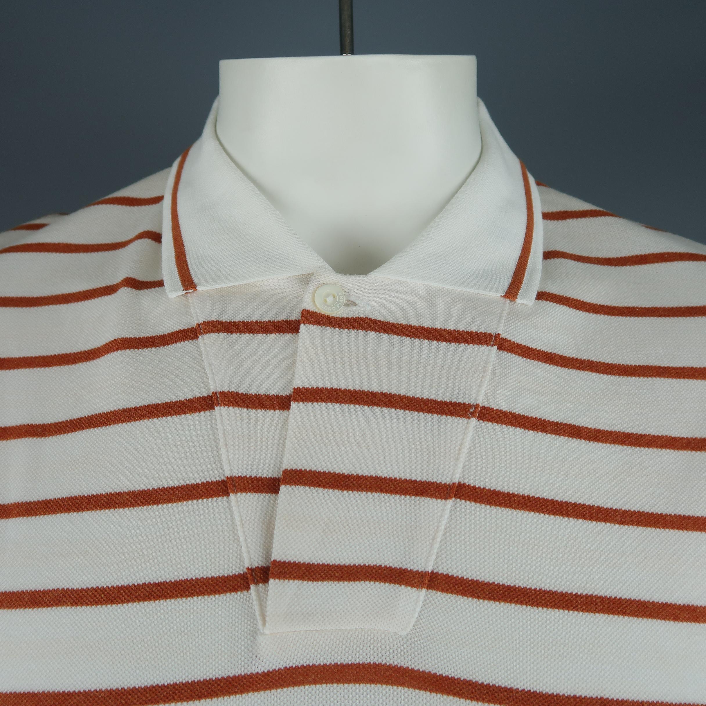 LORO PIANA polo comes in cream and burnt orange striped cotton pique with a single button collar. Made in Italy.
 
New with Tags.
Marked: XXL
 
Measurements:
 
Shoulder: 19 in.
Chest: 46 in.
Sleeve: 10 in.
Length: 29 in.