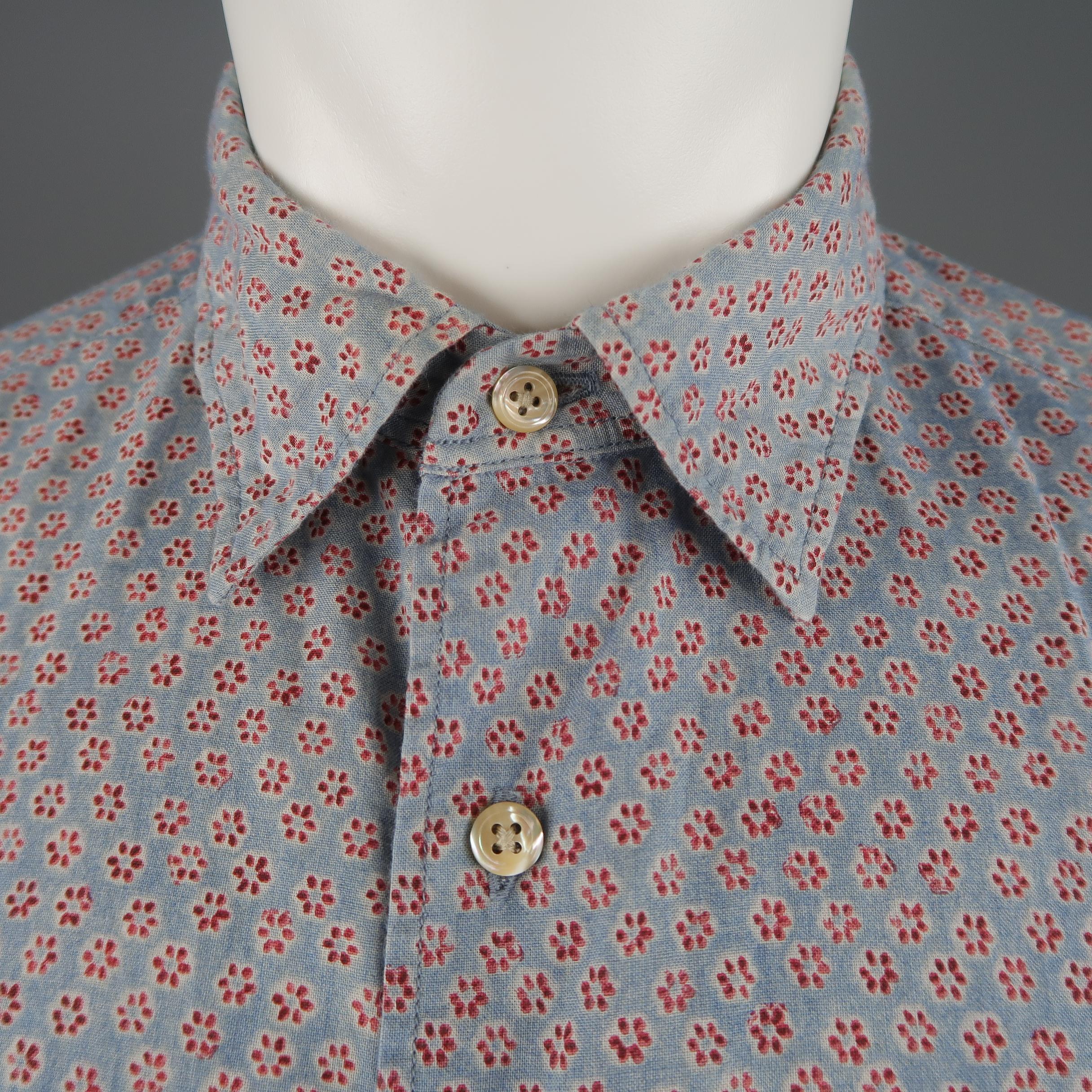 45RPM shirt comes in blue and red floral print cotton with a pointed collar, patch flap breast pocket, and embroidered R logo.  Made in Japan.
 
Excellent Pre-Owned Condition.
Marked: 4
 
Measurements:
 
Shoulder: 17 in.
Chest: 46 in.
Sleeve: 25