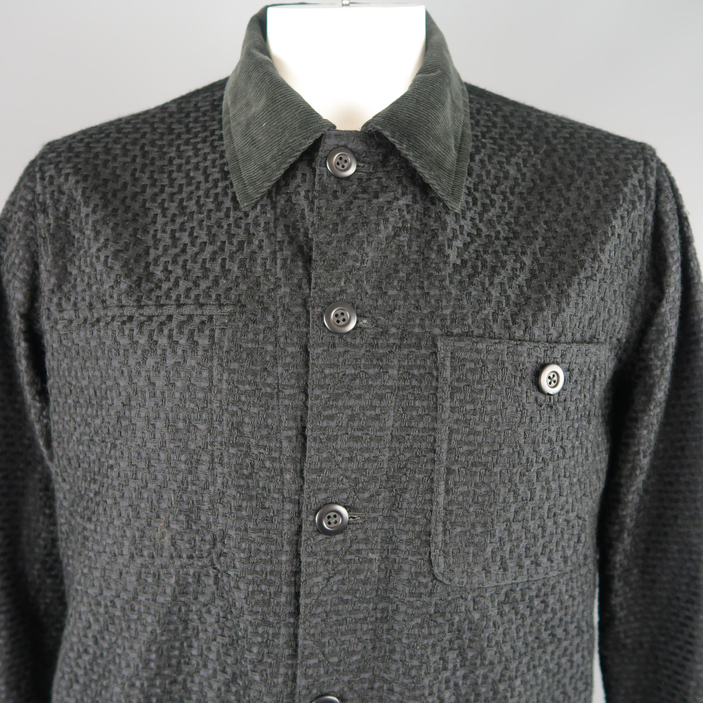 TS(S) long jacket comes in a woven textured wool blend fabric with a button up front, pointed corduroy collar, and triple patch pockets. Made in Japan.
 
Excellent Pre-Owned Condition.
Marked: JP 4
 
Measurements:
 
Shoulder: 18 in.
Chest: 46