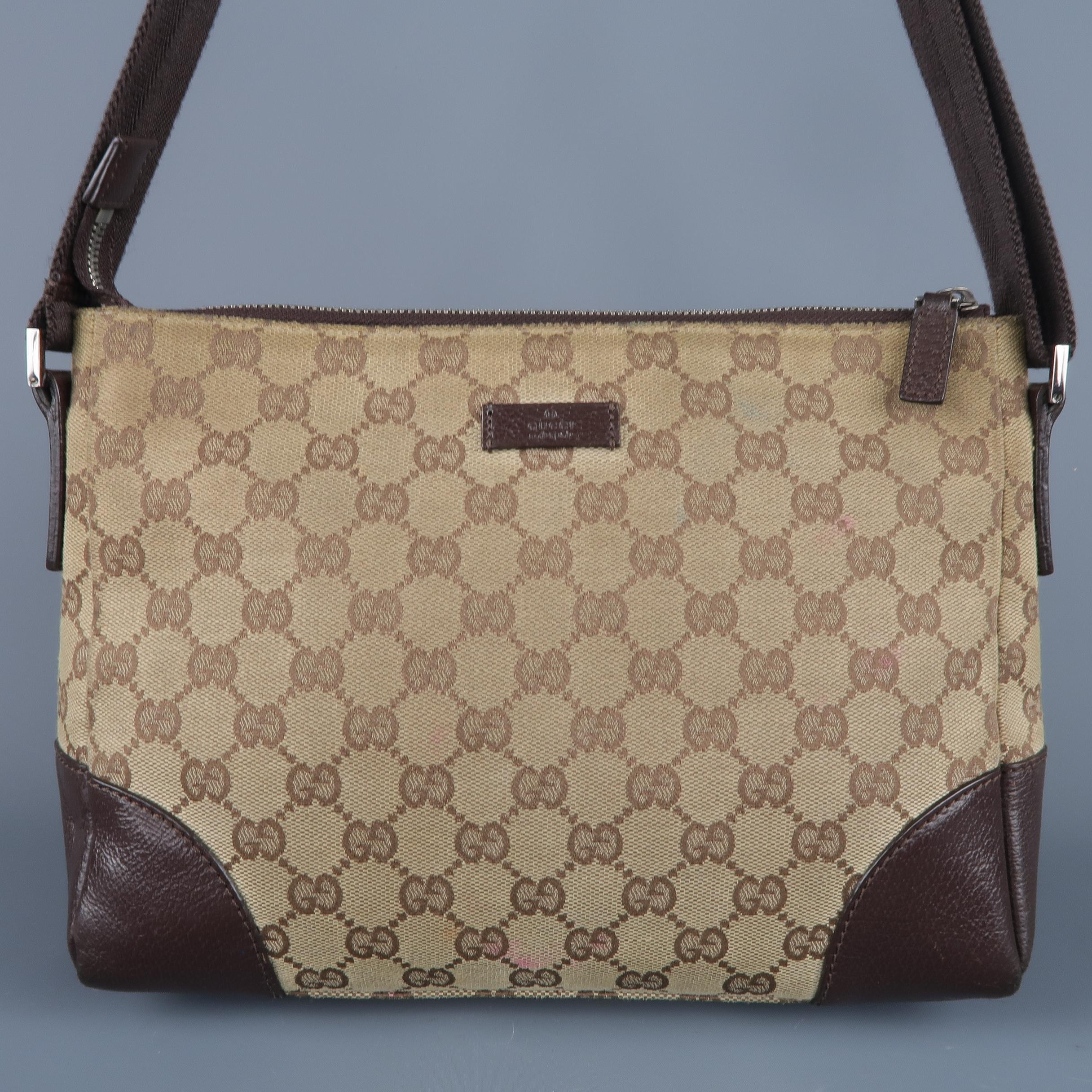 Vintage GUCCI bag comes in beige Guccissima monogram canvas with brown textured leather detailing, top zip closure, and adjustable webbing shoulder / crossbody strap. Stain and wear throughout. As-is. Made in Italy.
 
Fair Pre-Owned Condition.
