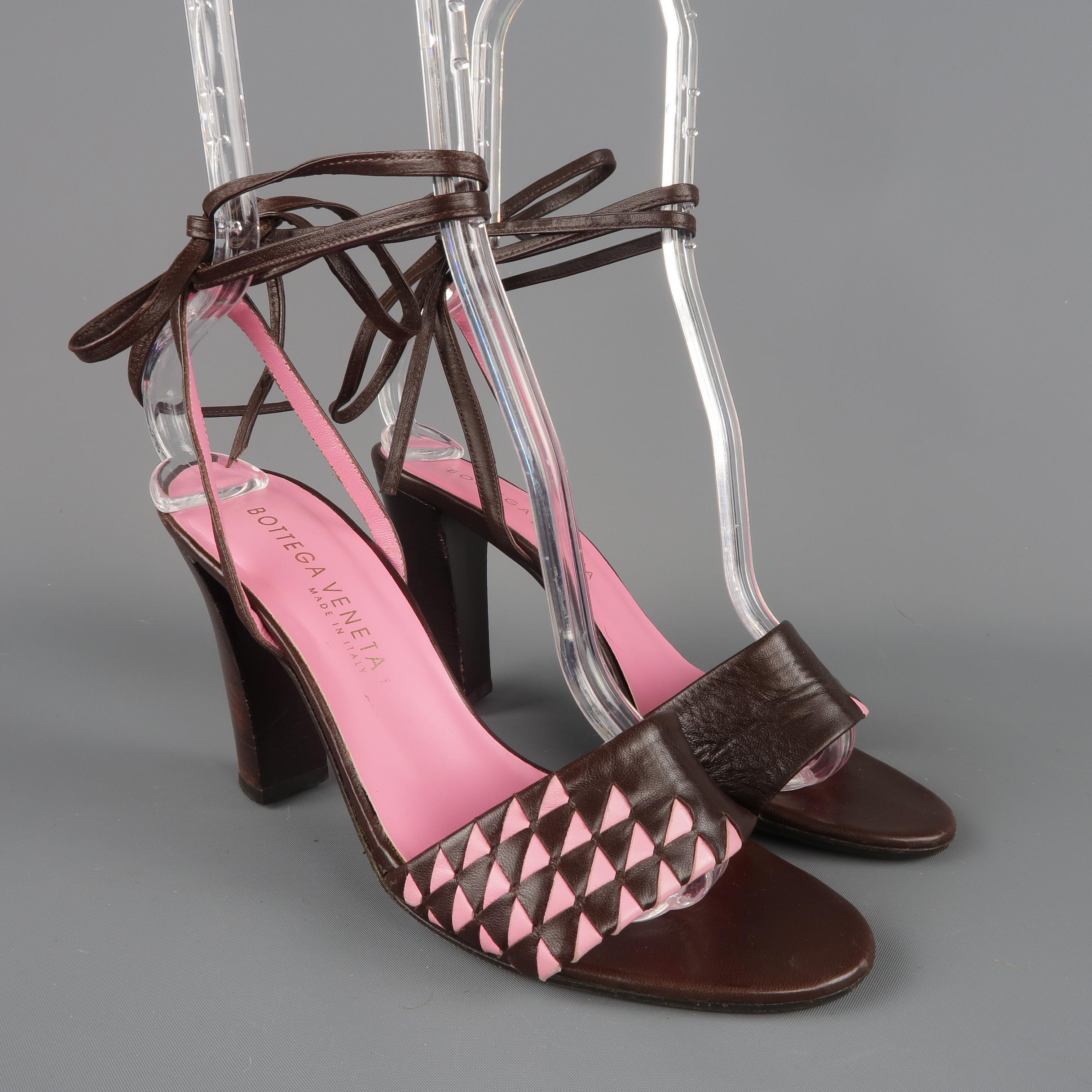 BOTTEGA VENETA sandals come in brown leather with a thick pink details toe strap, tied ankle strap, and chunky stacked heel. Resoled.Good Pre-Owned Condition.
Marked: IT 37
Measurements:
Heel: 3.75 in.