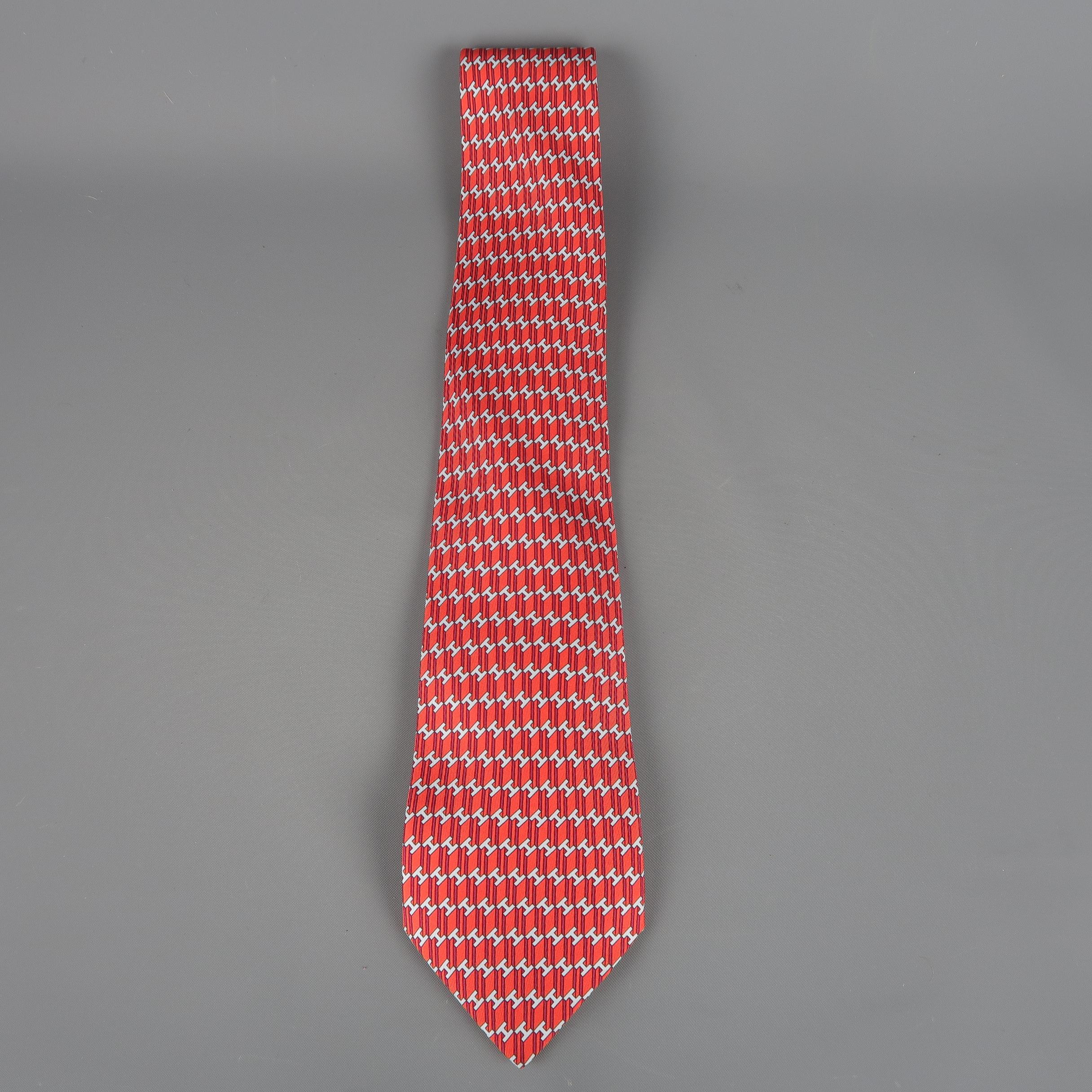 HERMES tie comes in red striped silk twill with an all over gray H print. Made in France.
 
Excellent Pre-Owned Condition.
 
Width: 3.5 in.