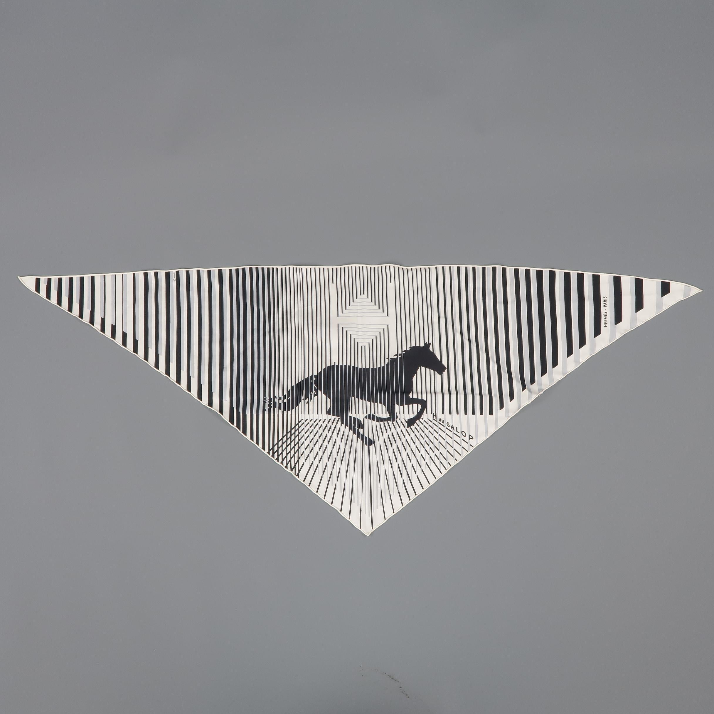 HERMES triangle scarf comes in black and white silk twill with an all over 