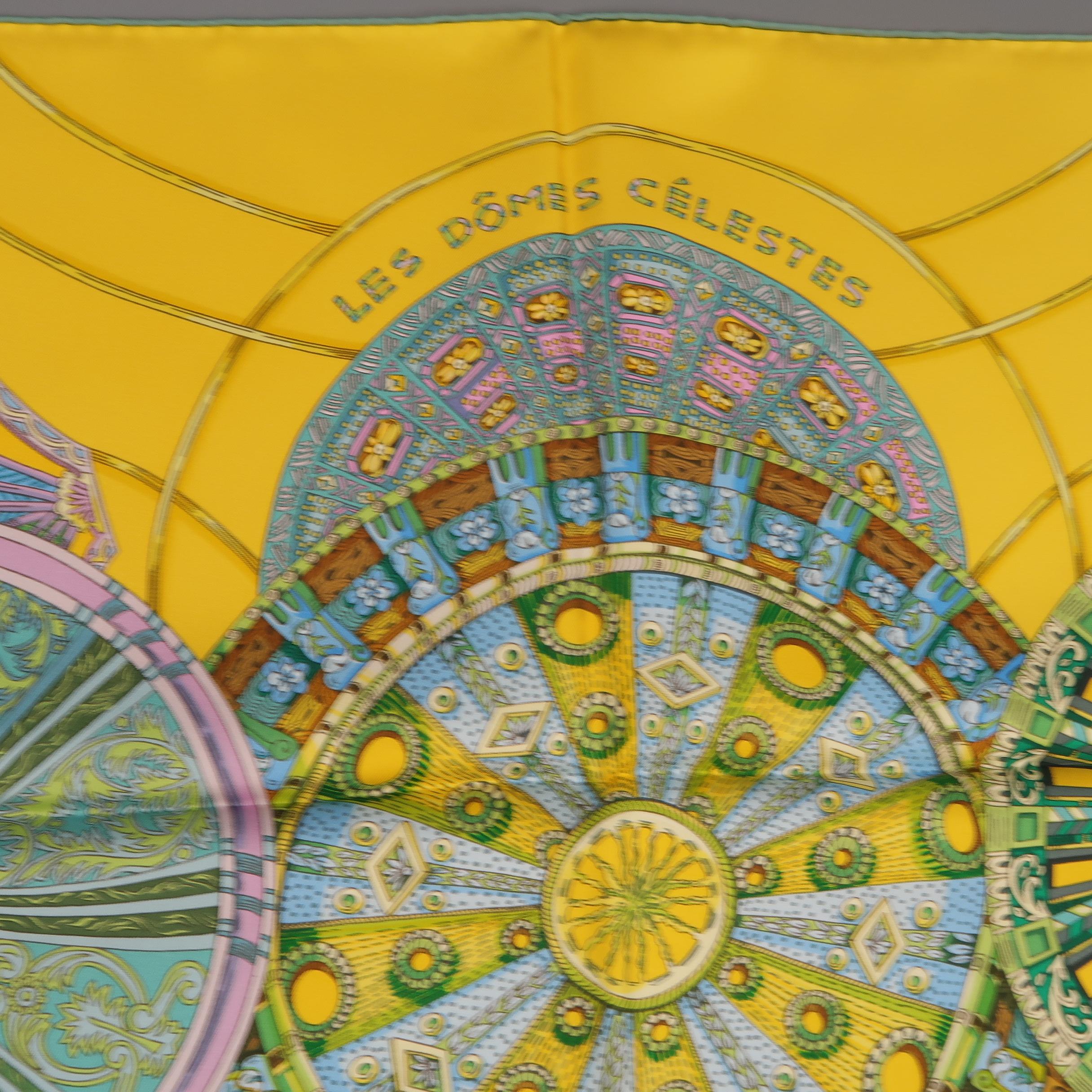 HERMES scarf comes in golden yellow silk twill with all over  