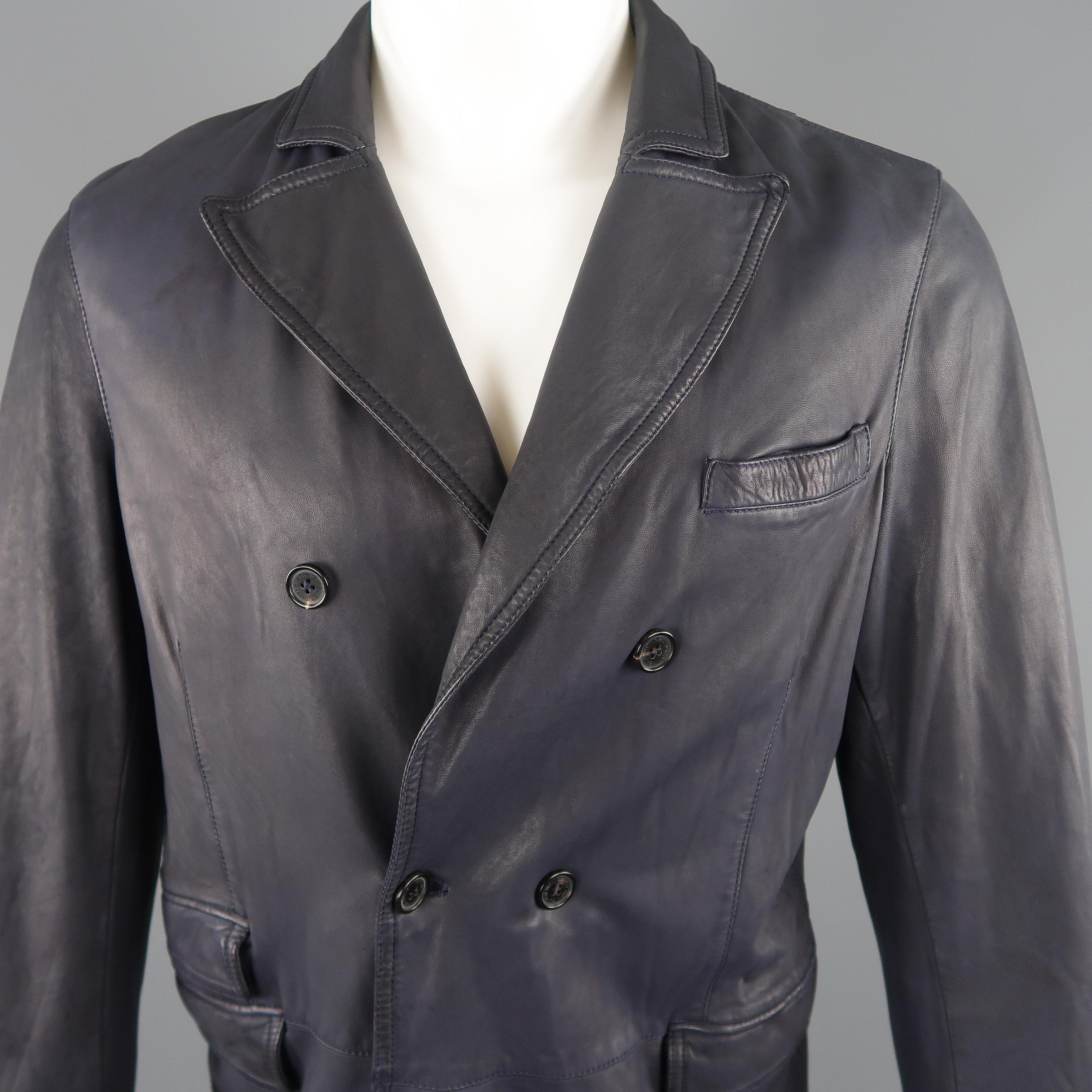 Double breasted NEIL BARRETT sport coat comes in muted navy blue leather with a peak lapel, and flap pockets. Wear consistent with age. Made in Italy.
 
Good Pre-Owned Condition.
Marked: M
 
Measurements:
 
Shoulder: 18 in.
Chest: 44 in.
Sleeve:  26