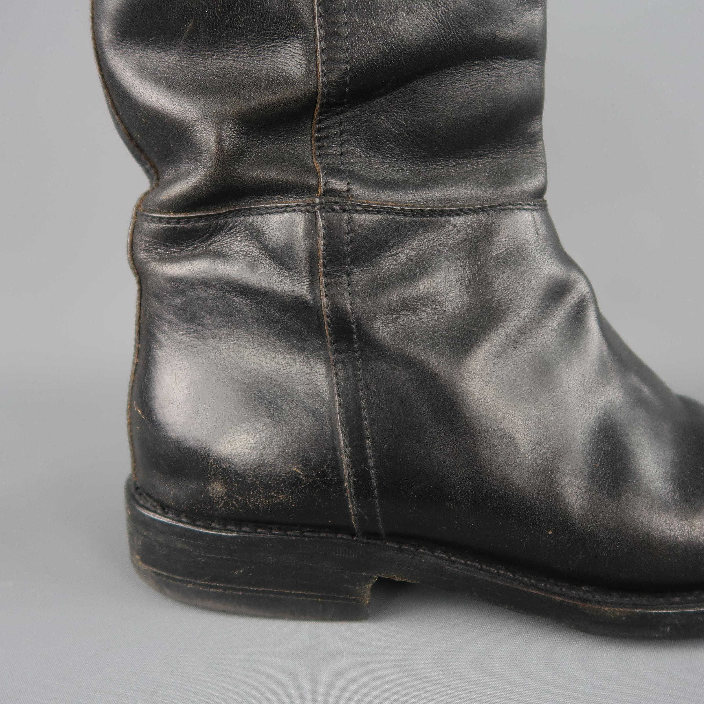 Yves Saint Laurent pull on biker boots come in black leather with a round toe and chunky, heeled sole. Wear throughout. Made in Italy.
 
Fair Pre-Owned Condition.
Marked: IT 42.5
 
Measurements:
 
Length: 10.5 in.