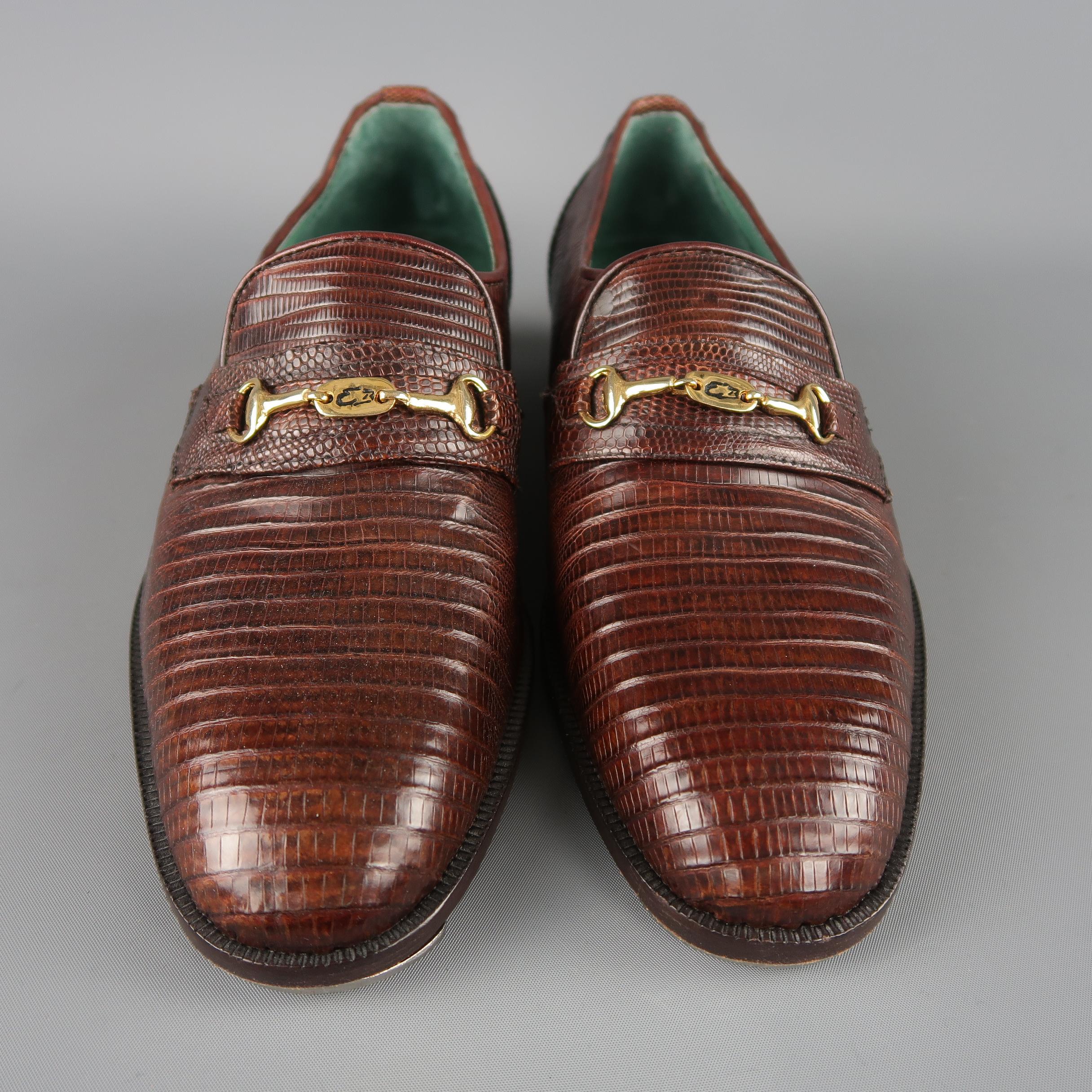 Emilio Parioli Vintage dress loafers come in brown lizard leather with a penny loafer strap adorned with gold tone hardware. Metal plates added. As-is.
 
Brand New.
Marked: UK 7.5
