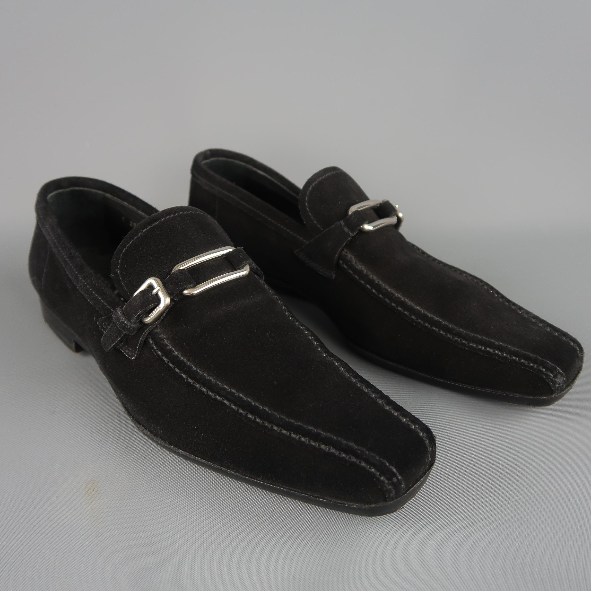 Vintage Prada loafers come in black suede with contrast stitching and a silver tone metal loop and buckle strap. Made in Italy.
 
Fair Pre-Owned Condition.
Marked: UK 6.5