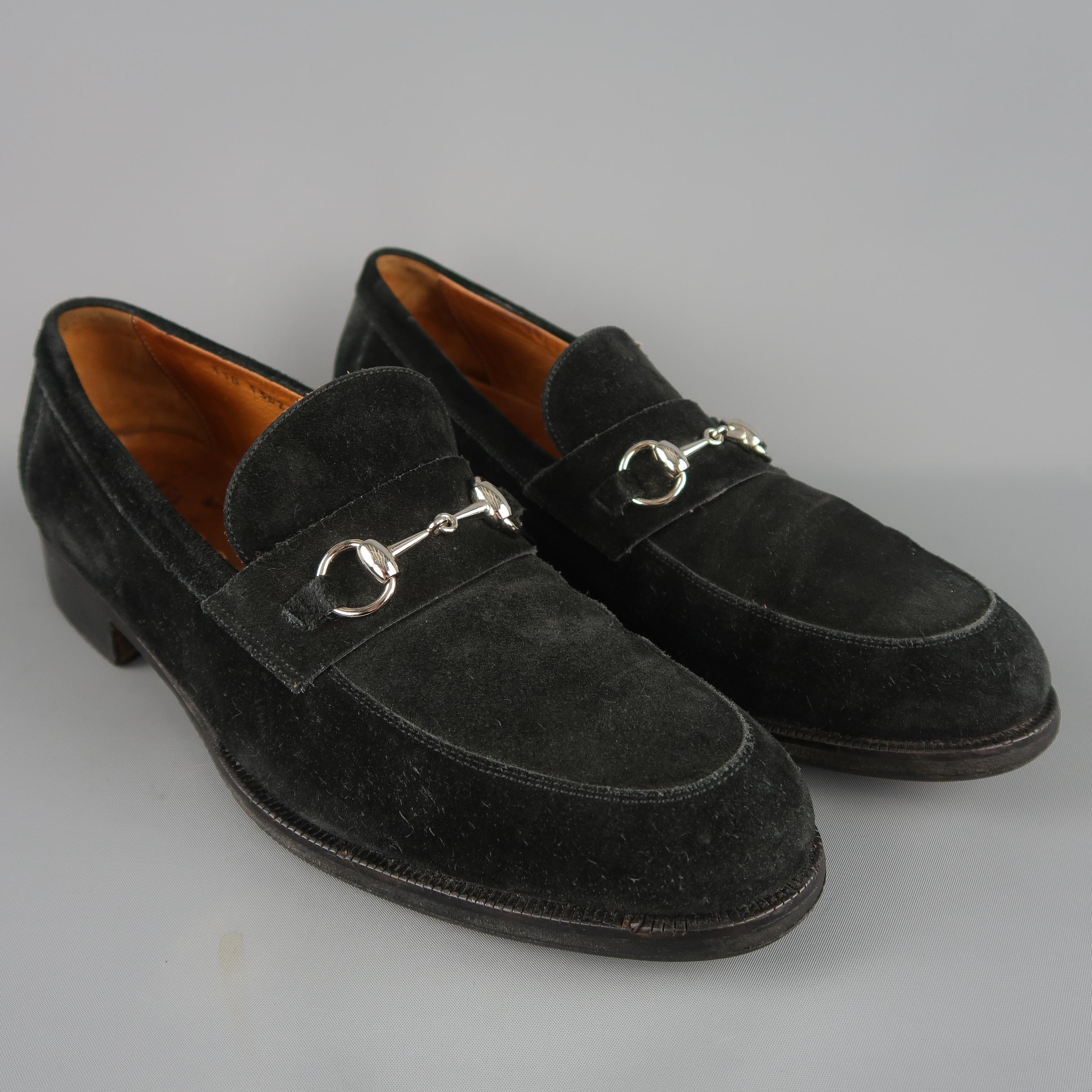 Vintage Gucci loafers come in black suede with a silver tone horsebit. Wear throughout. As-is. Made in Italy.
 
Fair Pre-Owned Condition.
Marked: 12 D