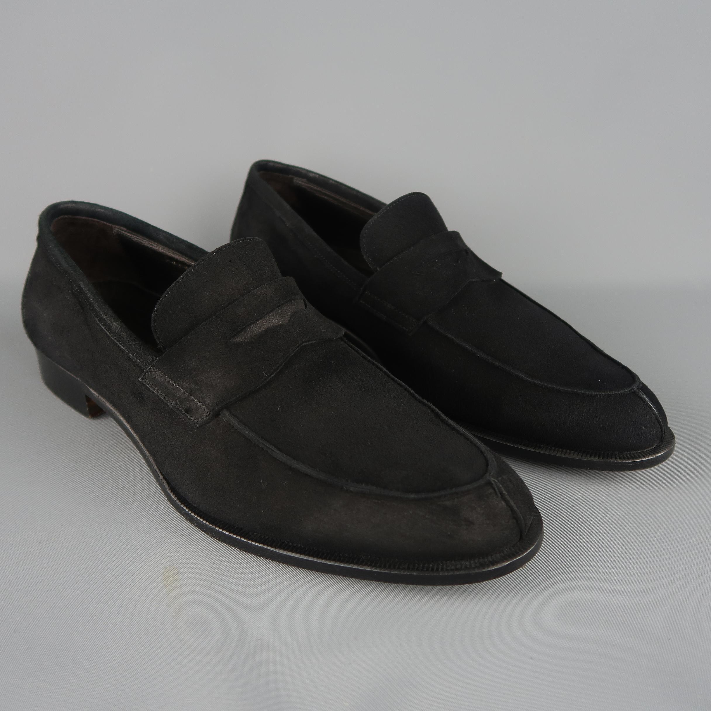 BRUNO MAGLI penny loafers come in black suede with a split apron toe and slit strap. Made in Italy.
 
Good Pre-Owned Condition.
Marked: UK 9.5