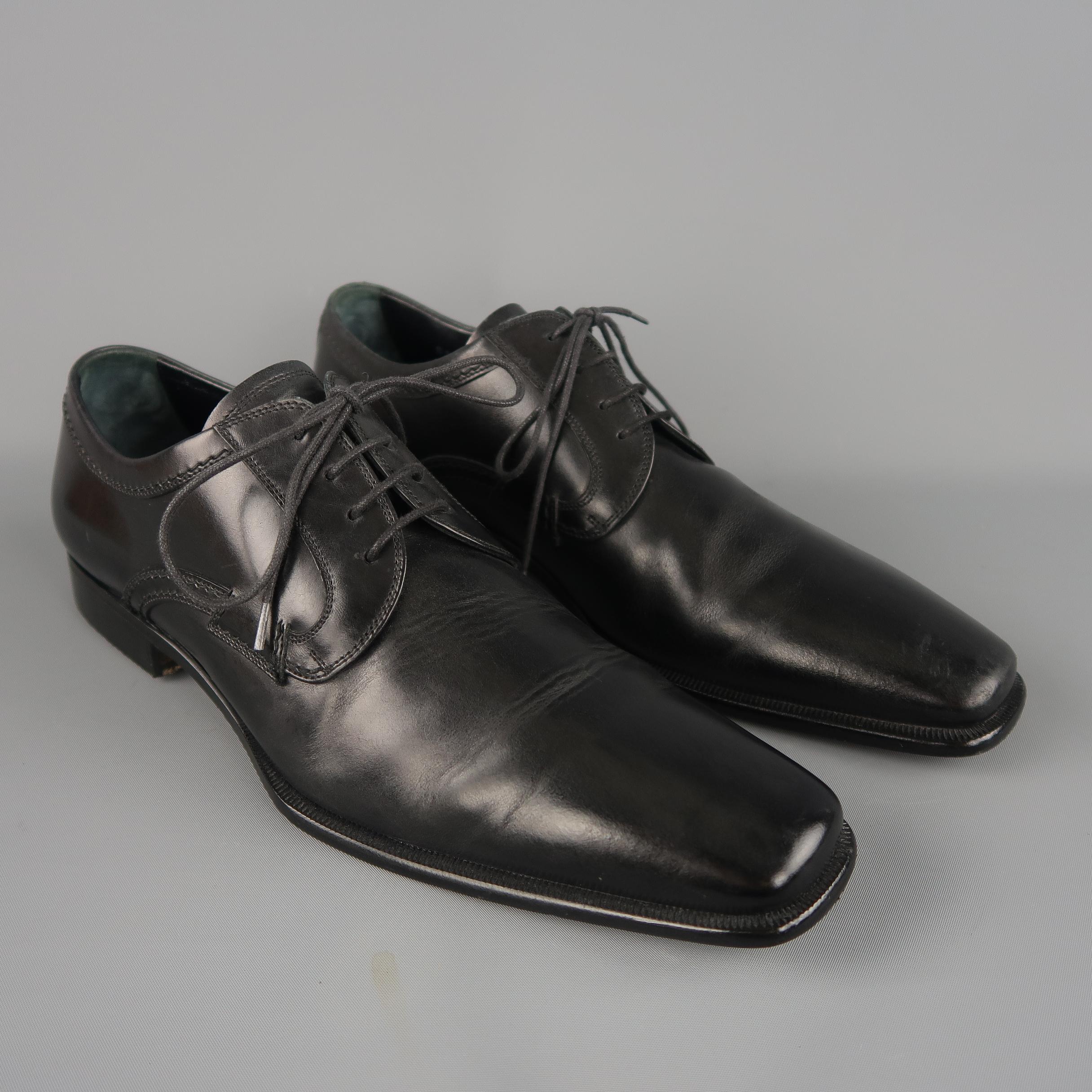 Dolce & Gabbana dress shoes come in black smooth leather with a streamline design and tapered square point toe. Made in Italy.
 
Good Pre-Owned Condition.
Marked: UK 6.5