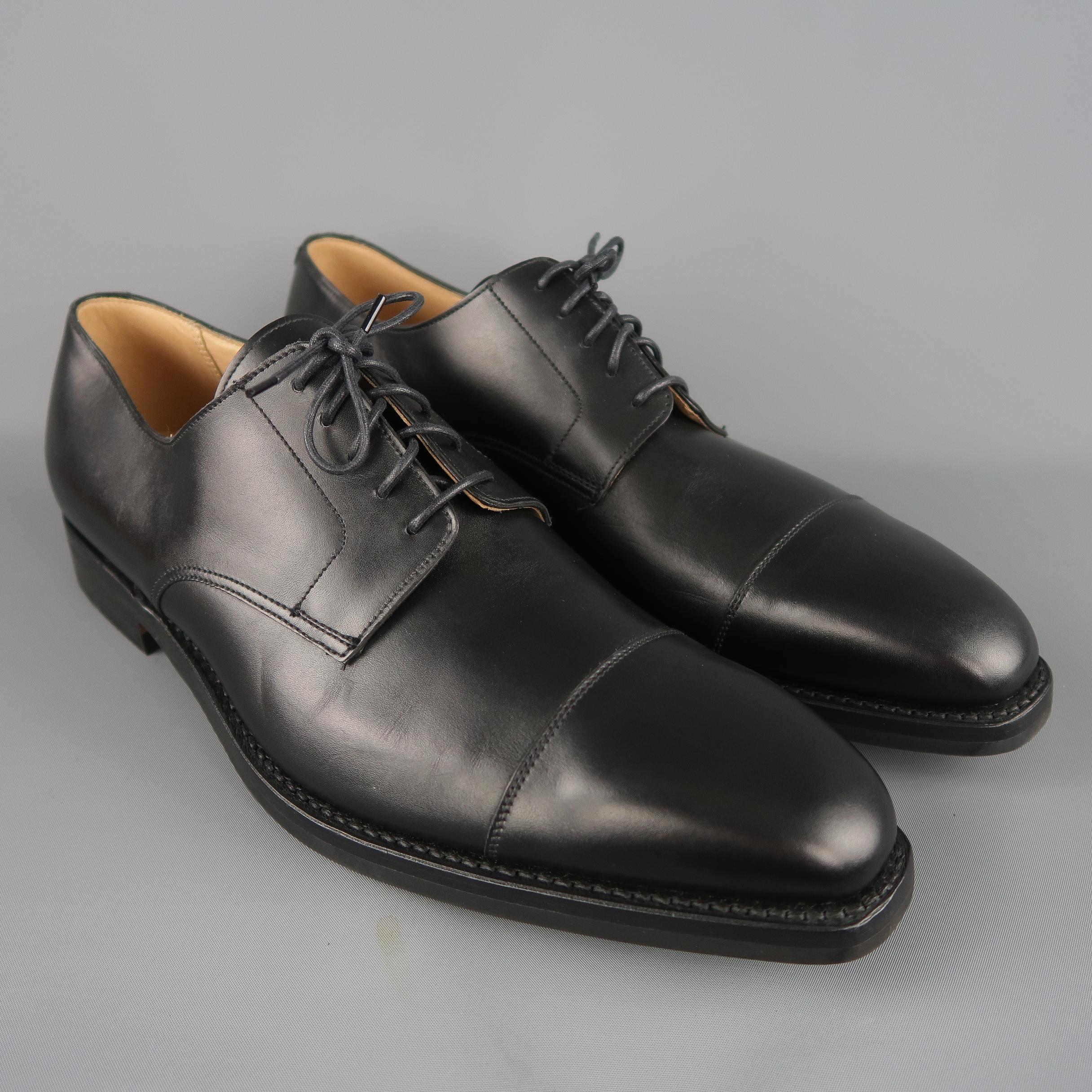 Crockett & Jones dress shoes come in smooth leather with a tapered cap toe and rubber heeled sole. Made in England.
 
Brand New.
Marked: UK 11