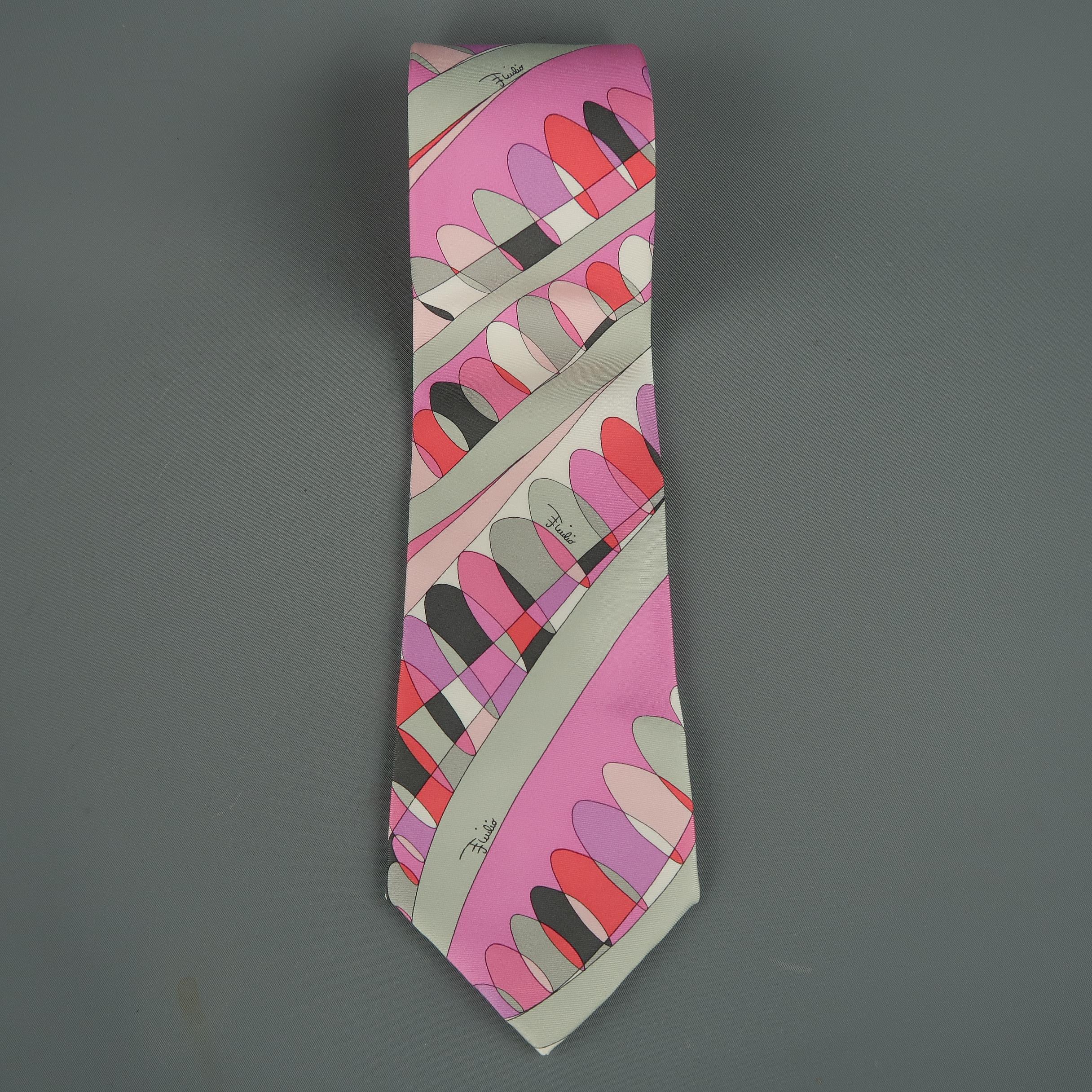 Emilio Pucci tie comes in silk twill with an all over signature print with hues of pinks, reds, and grays. Made in Italy.
 
Excellent Pre-Owned Condition.
 
Width: 3.5 in.