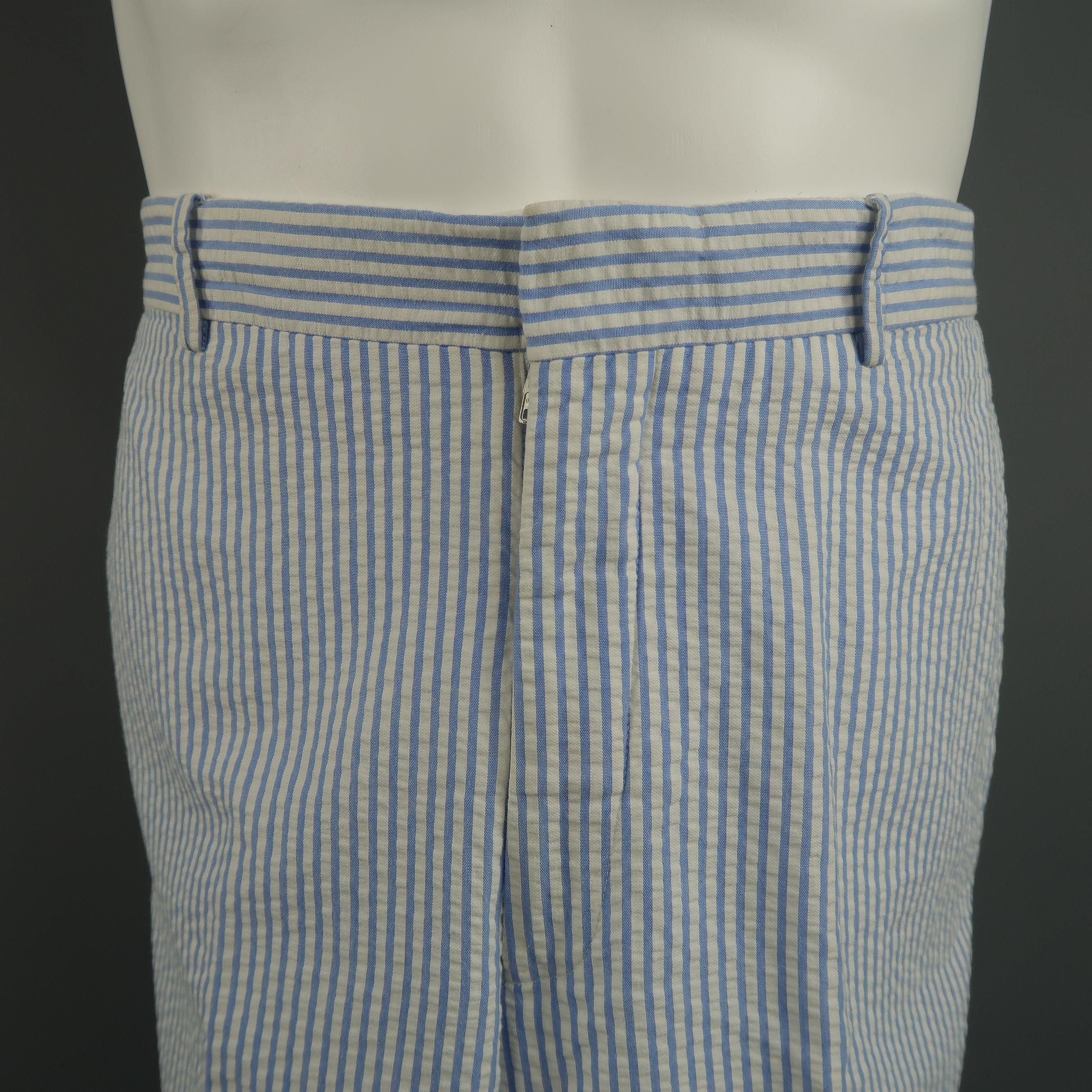 POLO by Ralph Lauren Classic casual pants, come in white and blue seersucker, with a classic tailoring closure and cuffed hem. Made in Italy.
 
Excellent Pre-Owned Condition.
Marked: (no size)
 
Measurements:
 
Waist: 31 in.
Rise: 11 in.
Inseam: 30