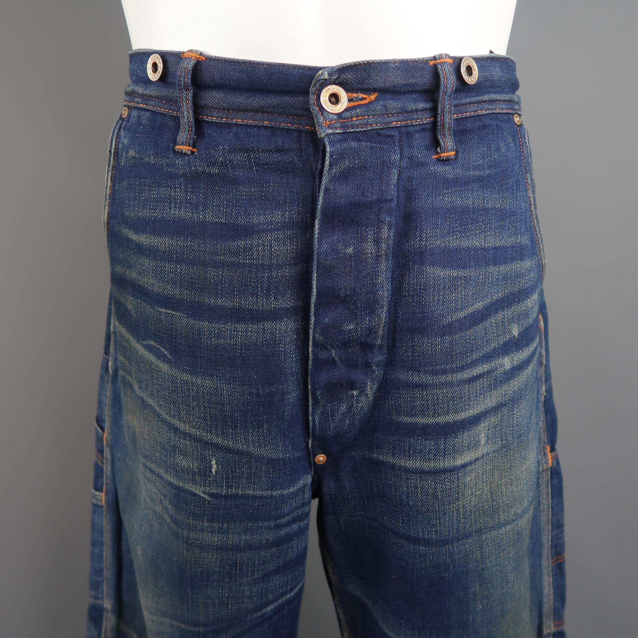 RRL by Ralph Lauren jeans come in medium dark selvedge denim with all over washed and distressed details throughout, brace suspender button  waistband, and back belt. Made in USA.
 
Good Pre-Owned Condition.
Marked: 33X32
 
Measurements:
 
Waist: 36