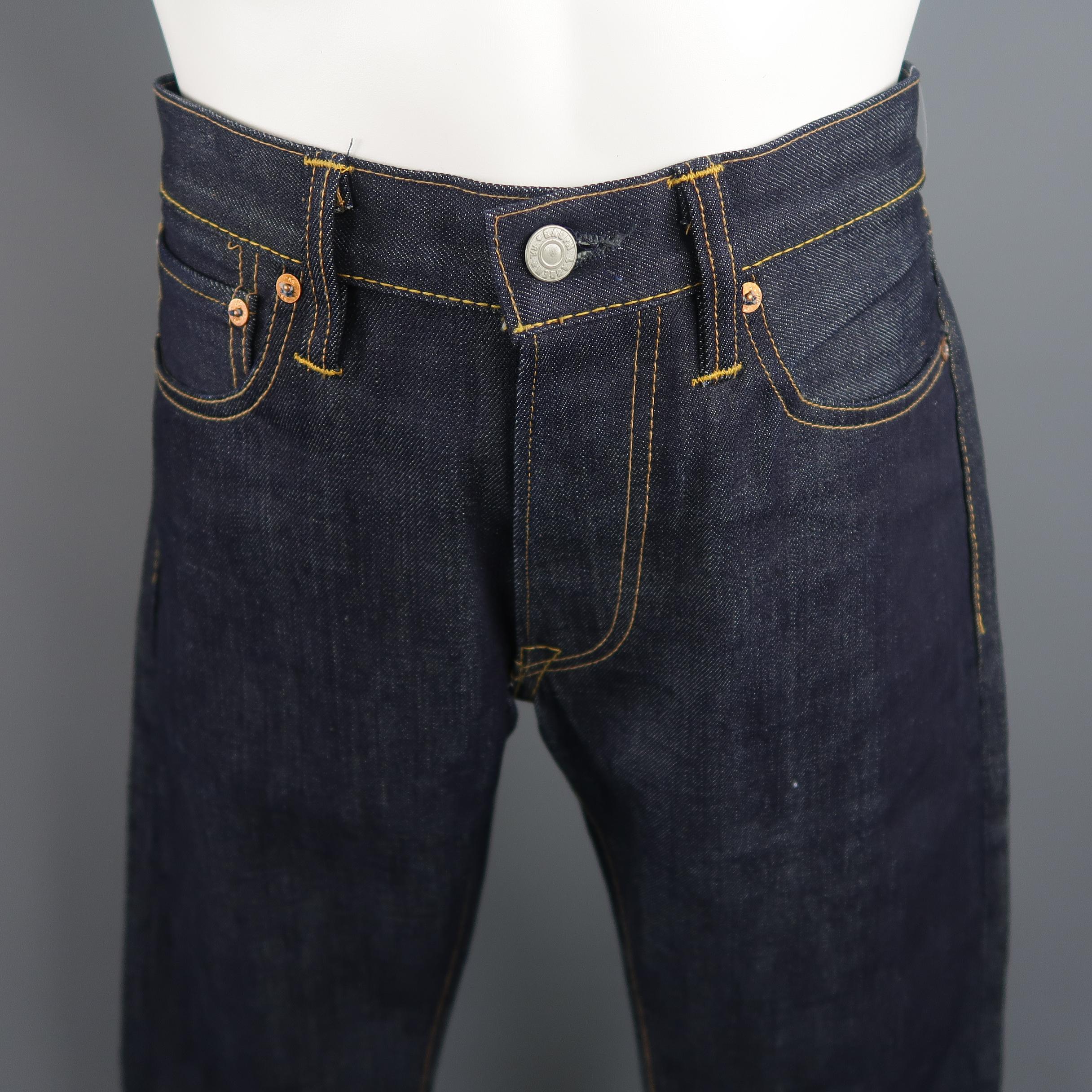 RRL by Ralph Lauren jeans come in indigo navy raw selvage denim with yellow contrast stitching and a classic fit. Made in USA.
 
Excellent Pre-Owned Condition.
Marked: 32 X 34
 
Measurements:
 
Waist: 34 in.
Rise: 10 in.
Inseam:  34 in.