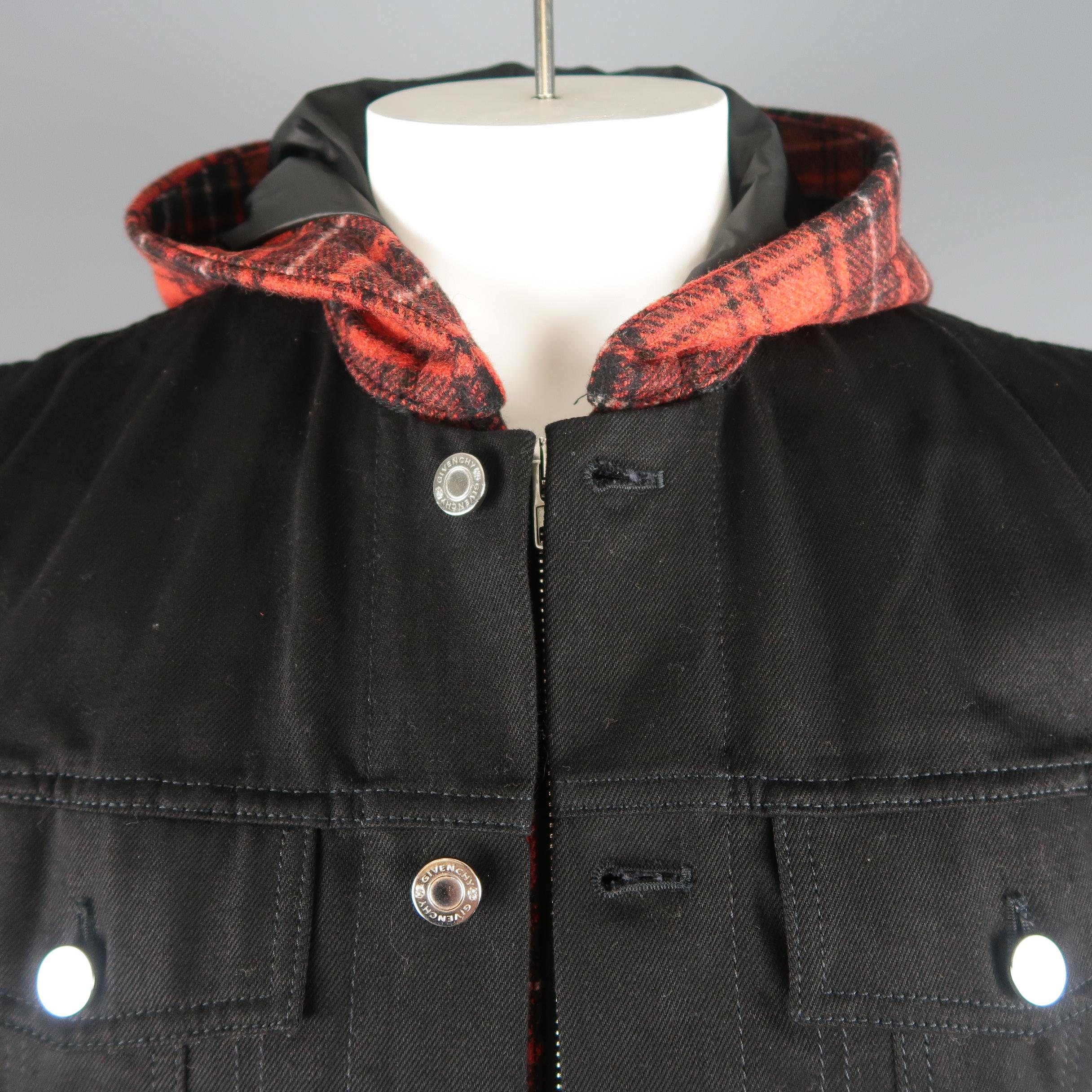 Givenchy By Riccardo Tisci jacket features a classic black cotton denim trucker jacket with sewn in red plaid wool flannel hooded, zip layer. Made in Portugal.
 
Excellent Pre-Owned Condition.
Marked: L
 
Measurements:
 
Shoulder: 17 in.
Chest: 44