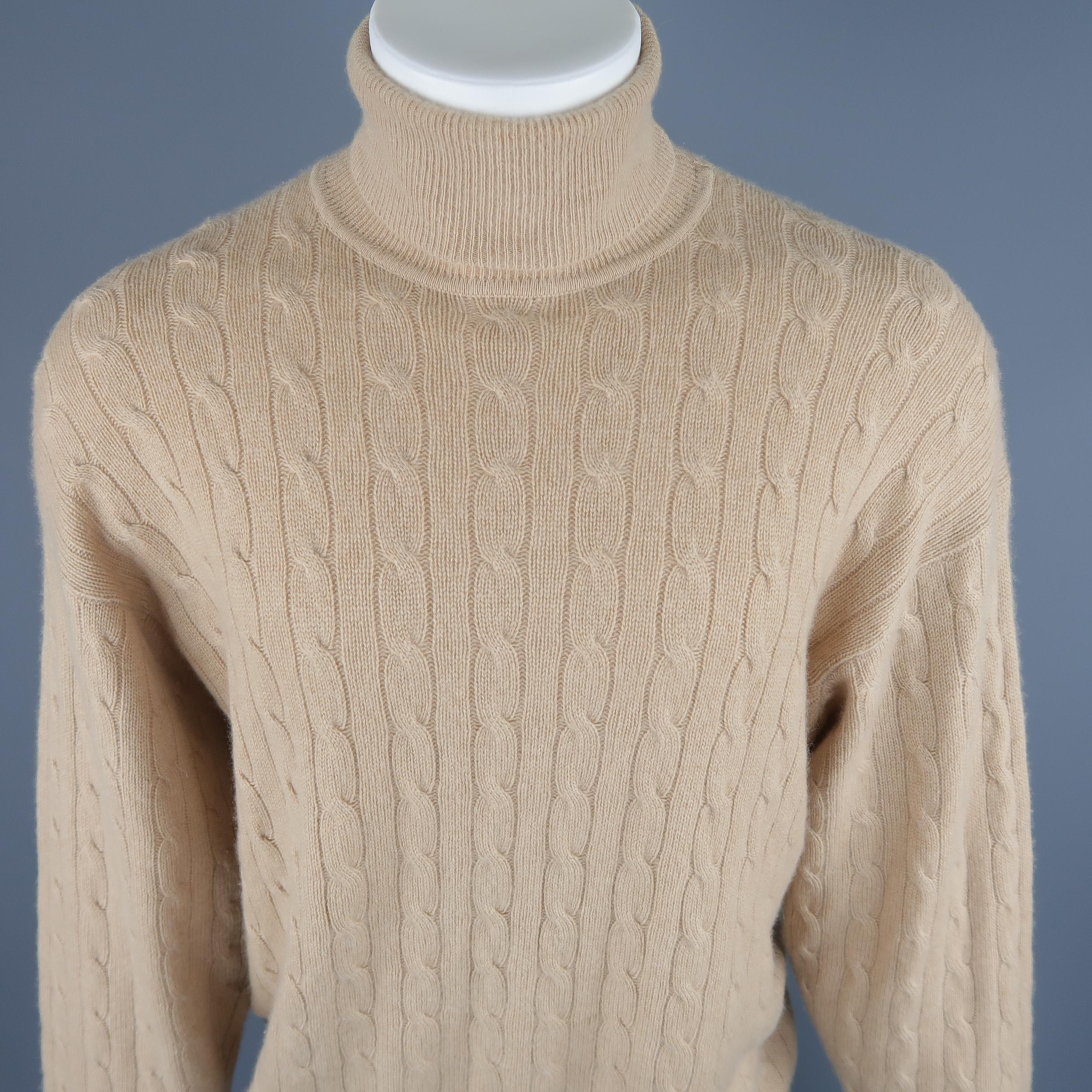Polo By Ralph Lauren Size XL sweater come in 100% Cashmere in a camel tone cable knit, with a turtleneck and ribbed cuff and waistband.
 
Good Pre-Owned Condition.
Marked: XL
 
Measurements:
 
Shoulder: 20 in.
Chest: 26 in.
Sleeve: 29 in.
Length: 30