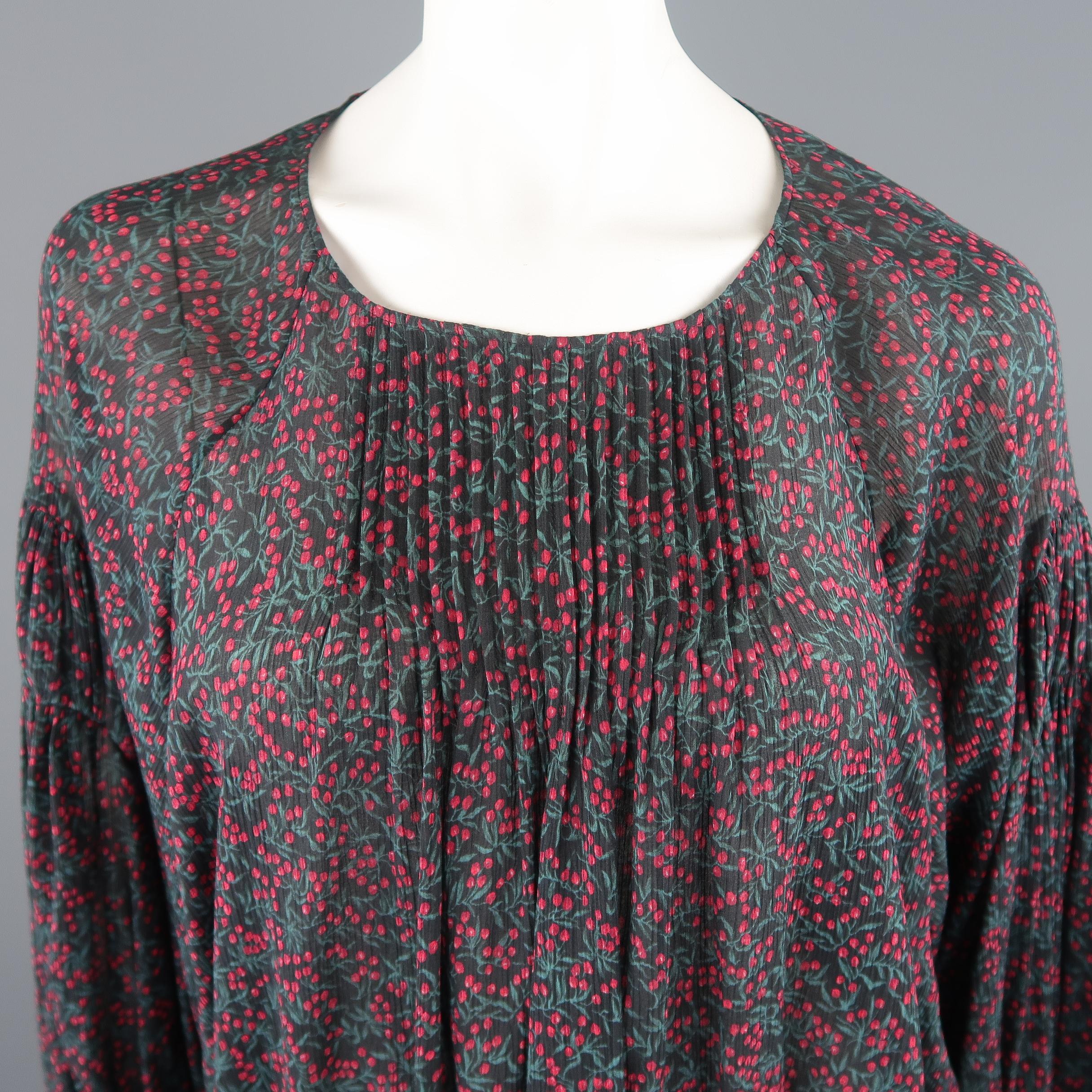 Chloe peasant blouse comes in black cotton silk blend textured chiffon with an all over green and red berry print, boat neck, pleated front, elastic gathered waistband, and bishop sleeves with ruffled, lace trimmed cuffs.  Retailed at $1040
