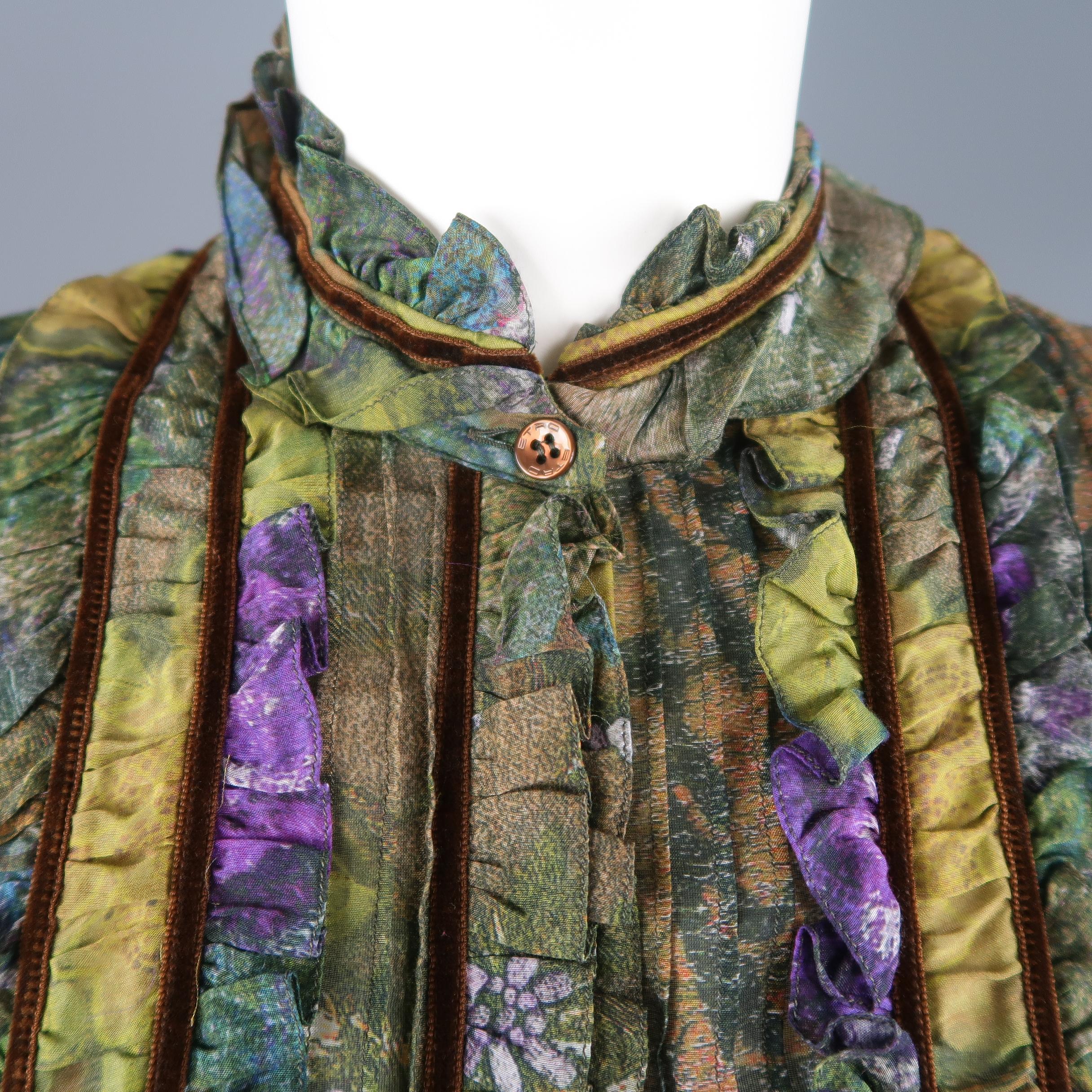 Etro pullover blouse comes in green abstract floral print chiffon with a brown velvet trimmed ruffle bib, pleated trim, and ruffled band collar. Made in Italy.
 
Excellent Pre-Owned Condition.
Marked: IT 40
 
Measurements:
 
Shoulder: 16 in.
Bust: