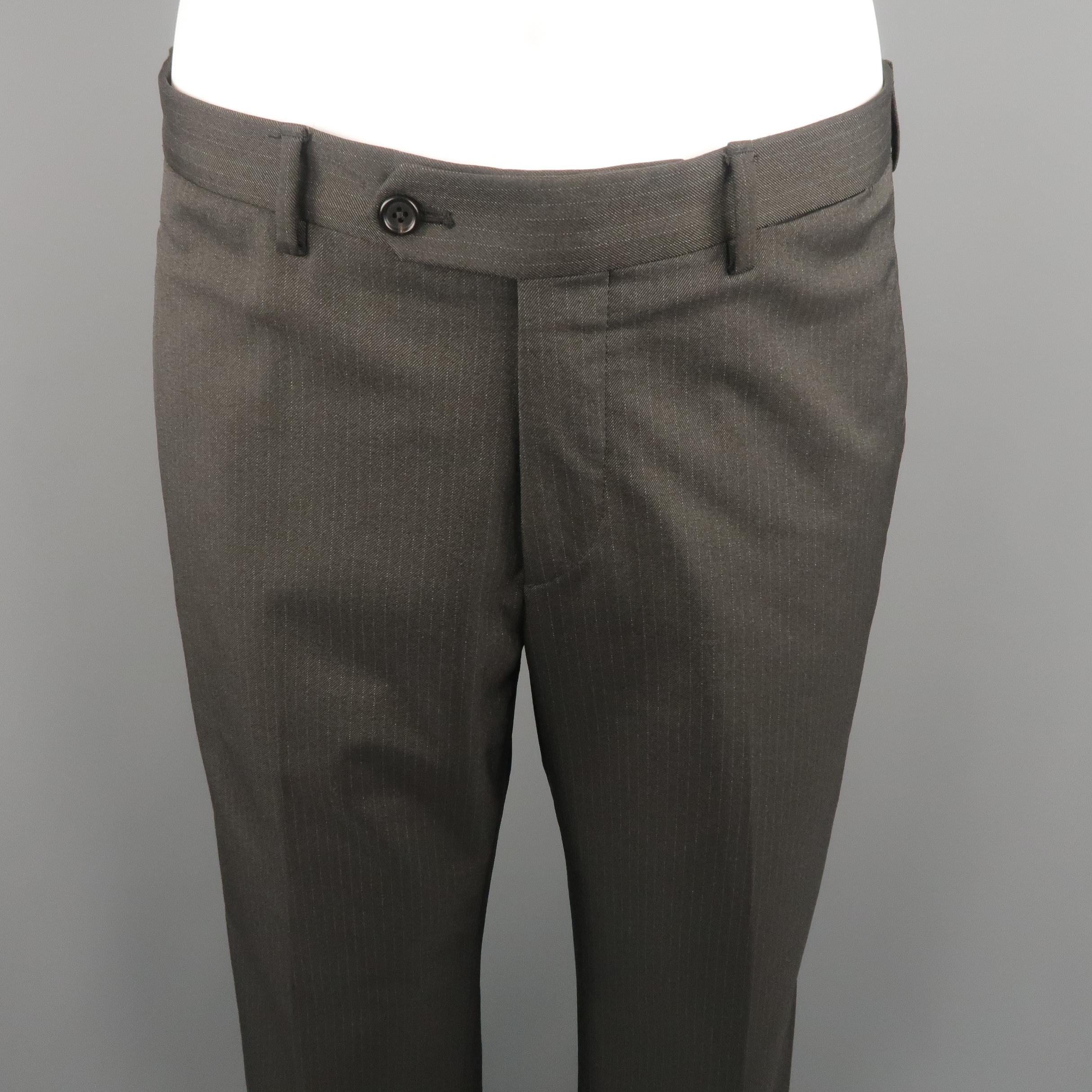 PRADA dress pants  in a charcoal tone, striped nylon blend with waistband, and piped pockets. Made in Italy.
 
Excellent Pre-Owned Condition.
Marked: 50  IT
 
Measurements:
 
Waist: 35 in.
Rise: 10 in.
Inseam: 33 in.