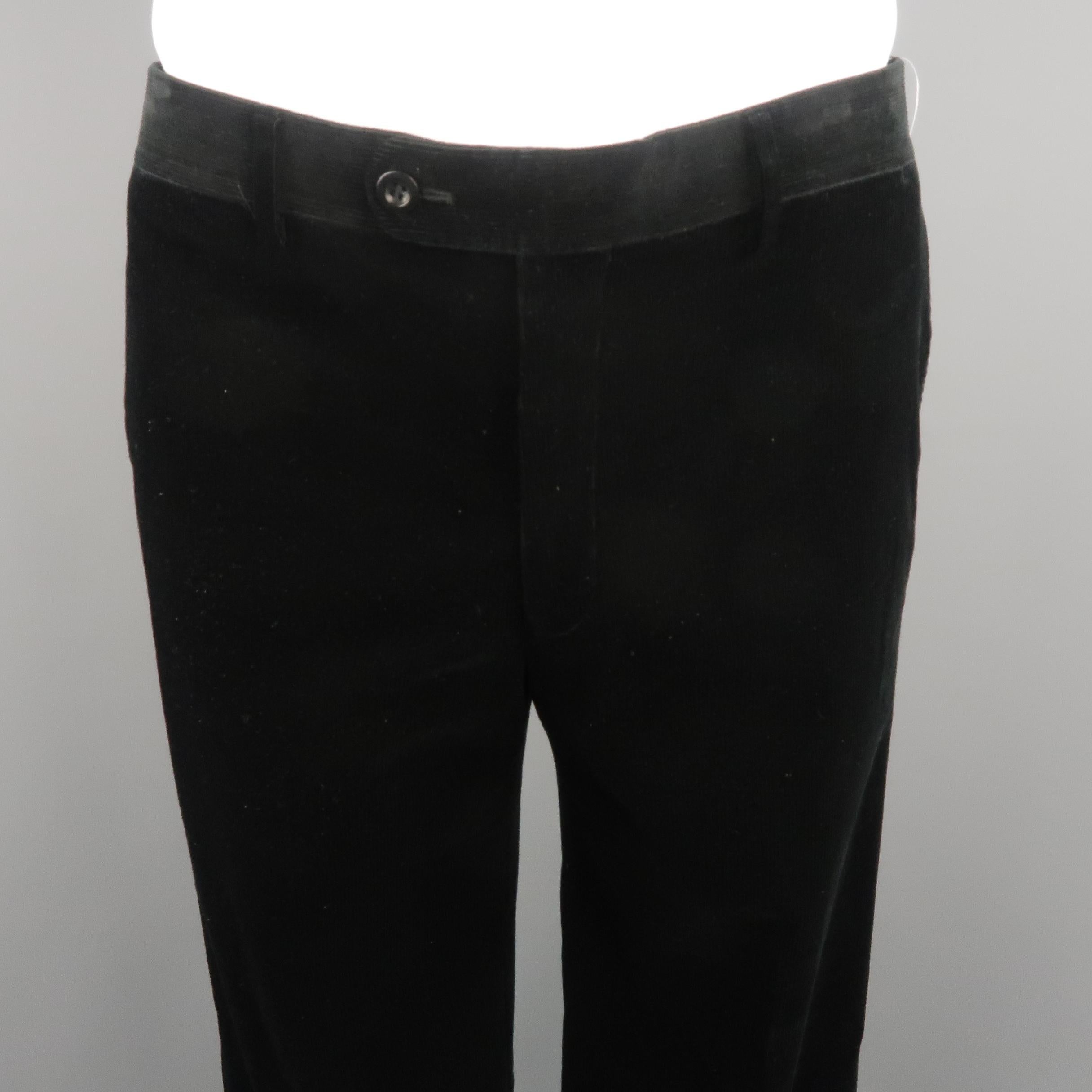 HERMES dress pants come in black tone corduroy, with front tab and piped pockets. Minor stains inside on the lining, dry clean removable. Made in Italy.
 
Excellent Pre-Owned Condition.
Marked: No size
 
Measurements:
 
Waist: 36 in.
Rise: 10.5