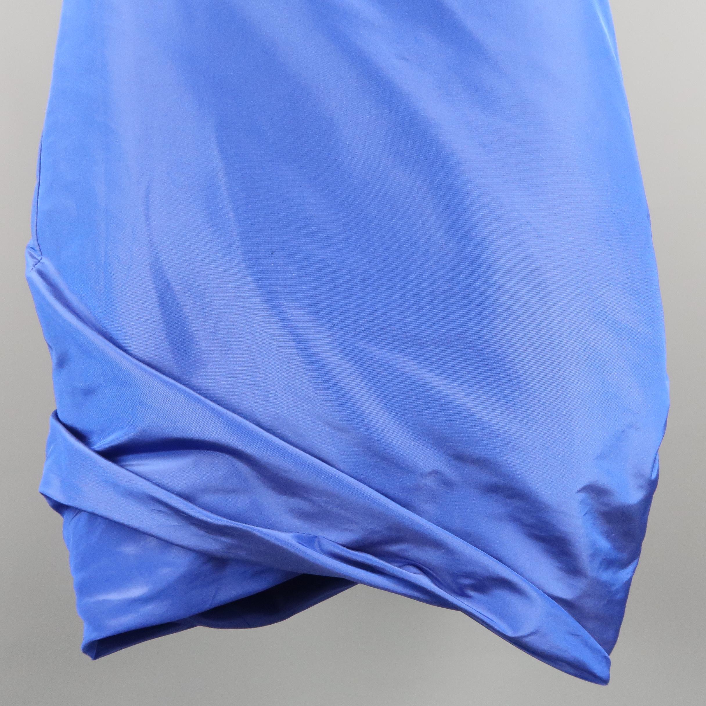 PAUW sporty asymmetrical skirt, comes in a blue tone silk, featuring a bubble hem. Made in Belgium.
 
Excellent Pre-Owned Condition.
Marked: 1
 
Measurements:
 
Waist: 30 in.
Hip: 38 in.
Length: 25 in.
