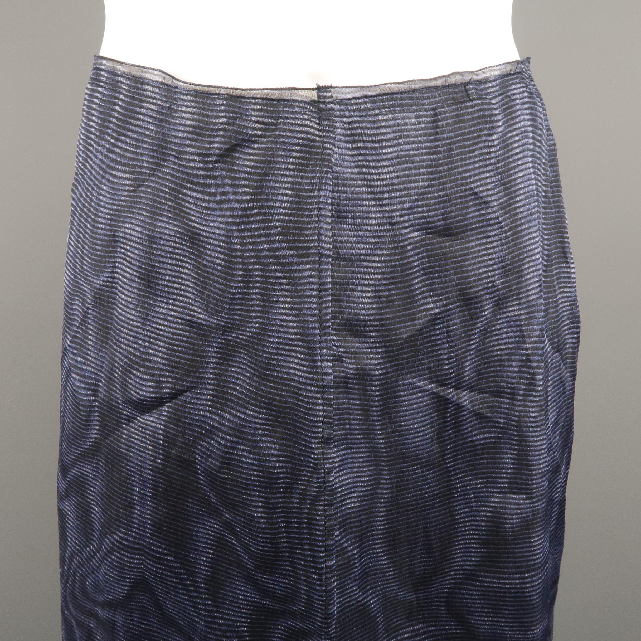 PRADA classic pencil skirt, come in blue tones and silk moare material, featuring see through overlay. Made in Italy.
 
Excellent Pre-Owned Condition.
Marked: 42 IT
 
Measurements:
 
Waist: 30 in.
Hip: 38 in.
Length: 28.5 in.