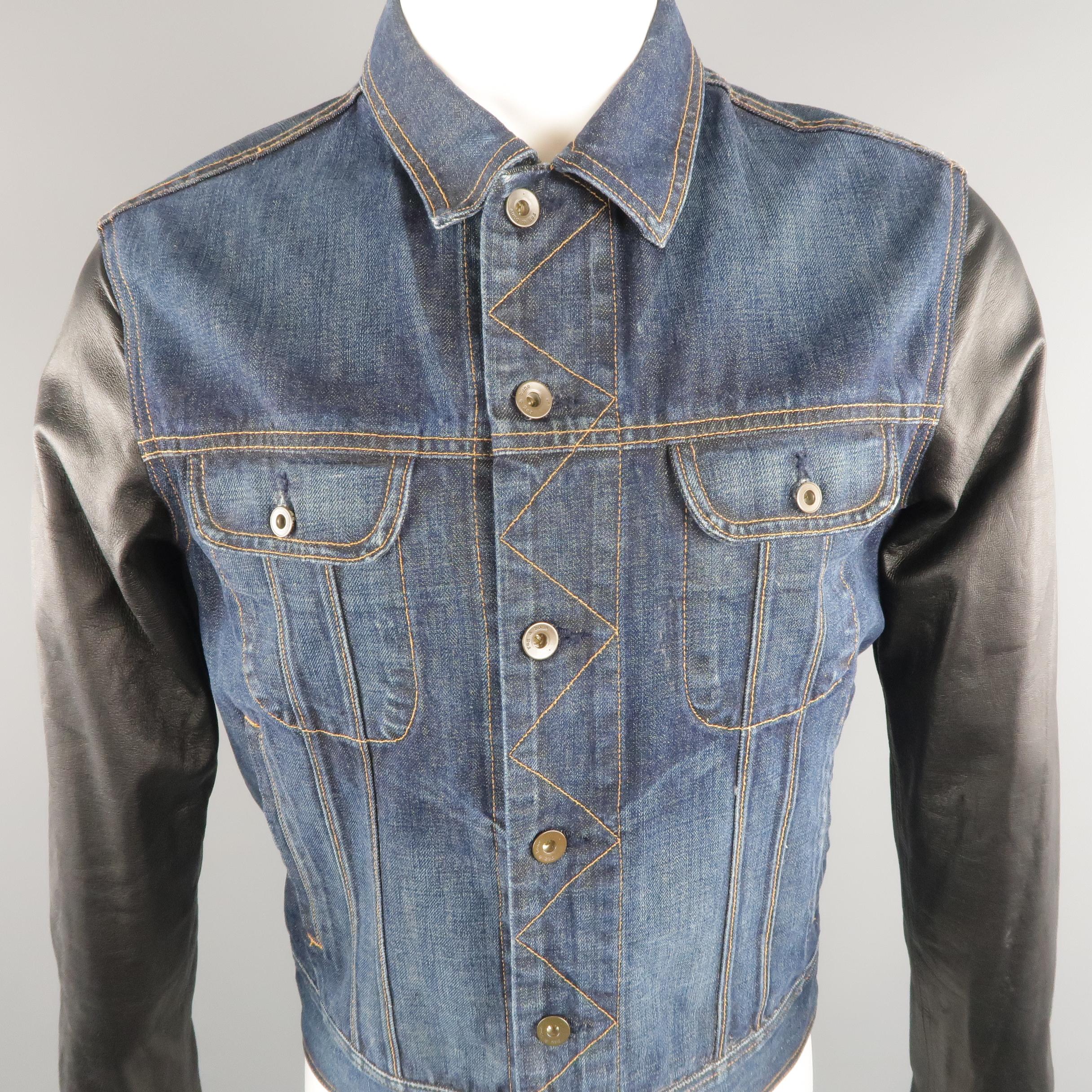 RAG & BONE trucker jacket come in indigo denim, leather sleeves, contrast stitches, and patch flap pockets. Made in USA
 
Excellent Pre-Owned Condition.
Marked: M US
 
Measurements:
 
Shoulder: 17 in.
Chest: 41 in.
Sleeve: 27 in.
Length: 24.5 in.   