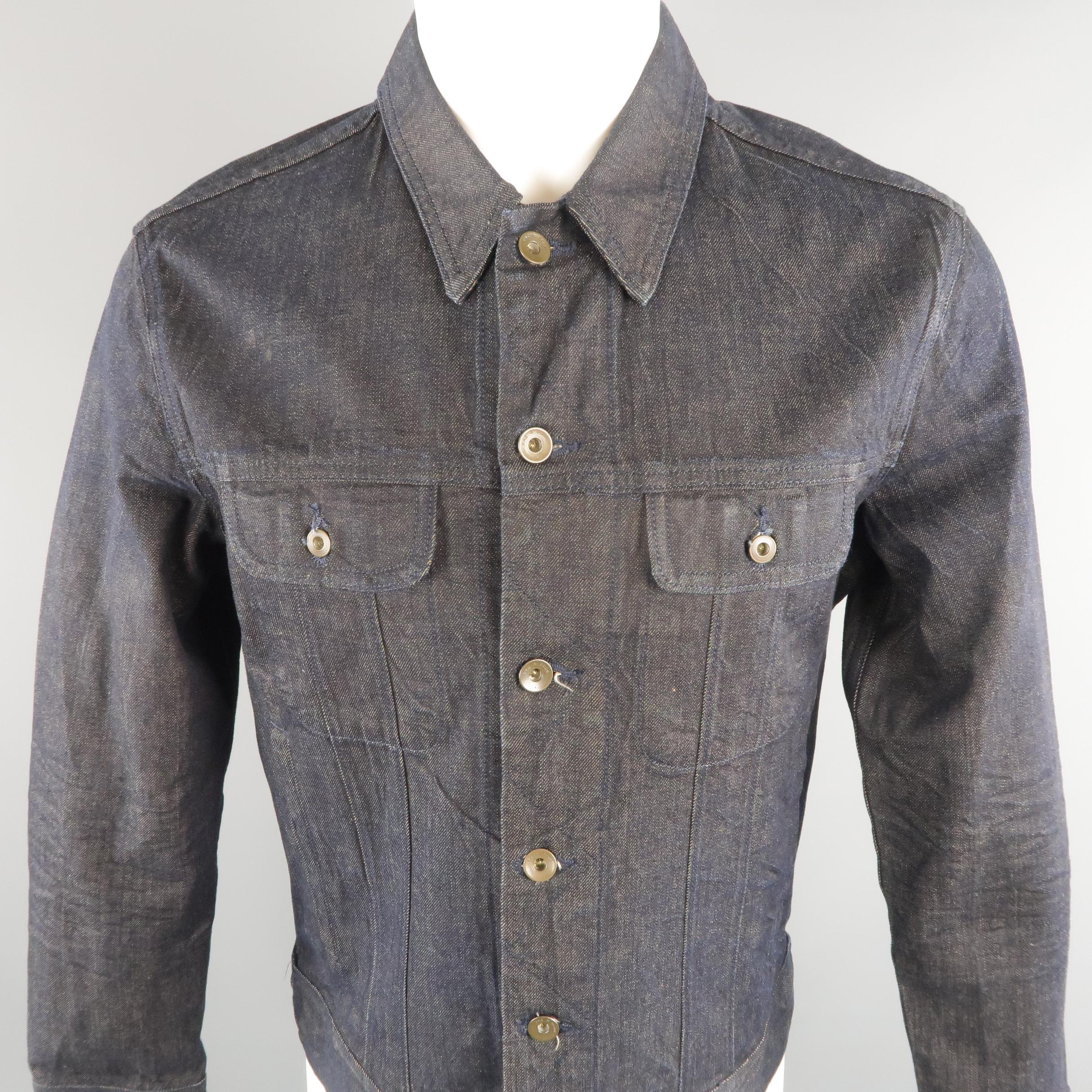 RAG & BONE trucker jacket come in indigo solid denim, same tone stitches, patch flap  pockets and waist adjusters. Made in USA.
 
New with tags.
Marked: M
Measurements:
 
Shoulder: 18 in.
Chest: 42 in.
Sleeve: 26 in.
Length: 26 in.