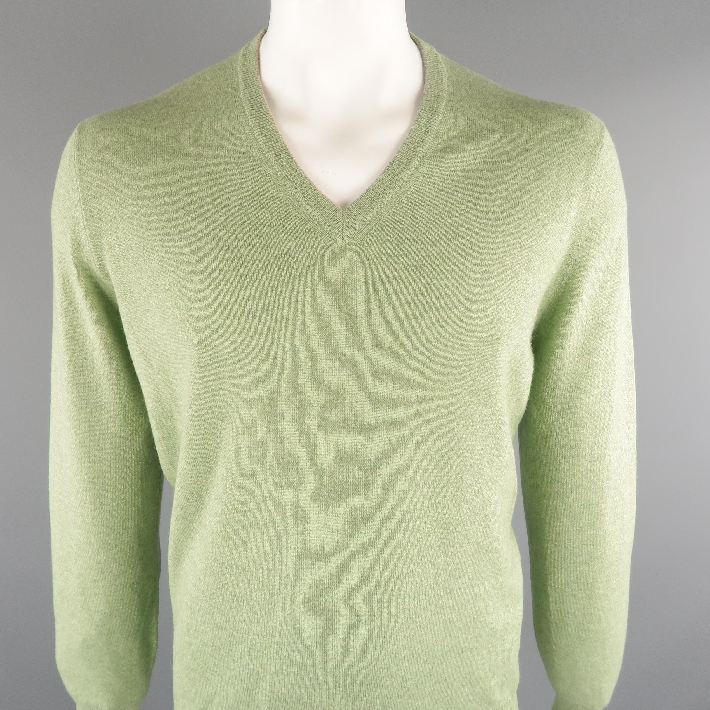 BRUNELLO CUCINELLI sweater comes in 100% cashmere in a green tone, ribbed knit, V-neck, with ribbed cuff and waistband. Made in Italy.
 
New with Tags.
Marked: 54 IT
 
Measurements:
 
Shoulder: 18 in.
Chest: 46 in.
Sleeve: 27 in.
Length: 28 in.