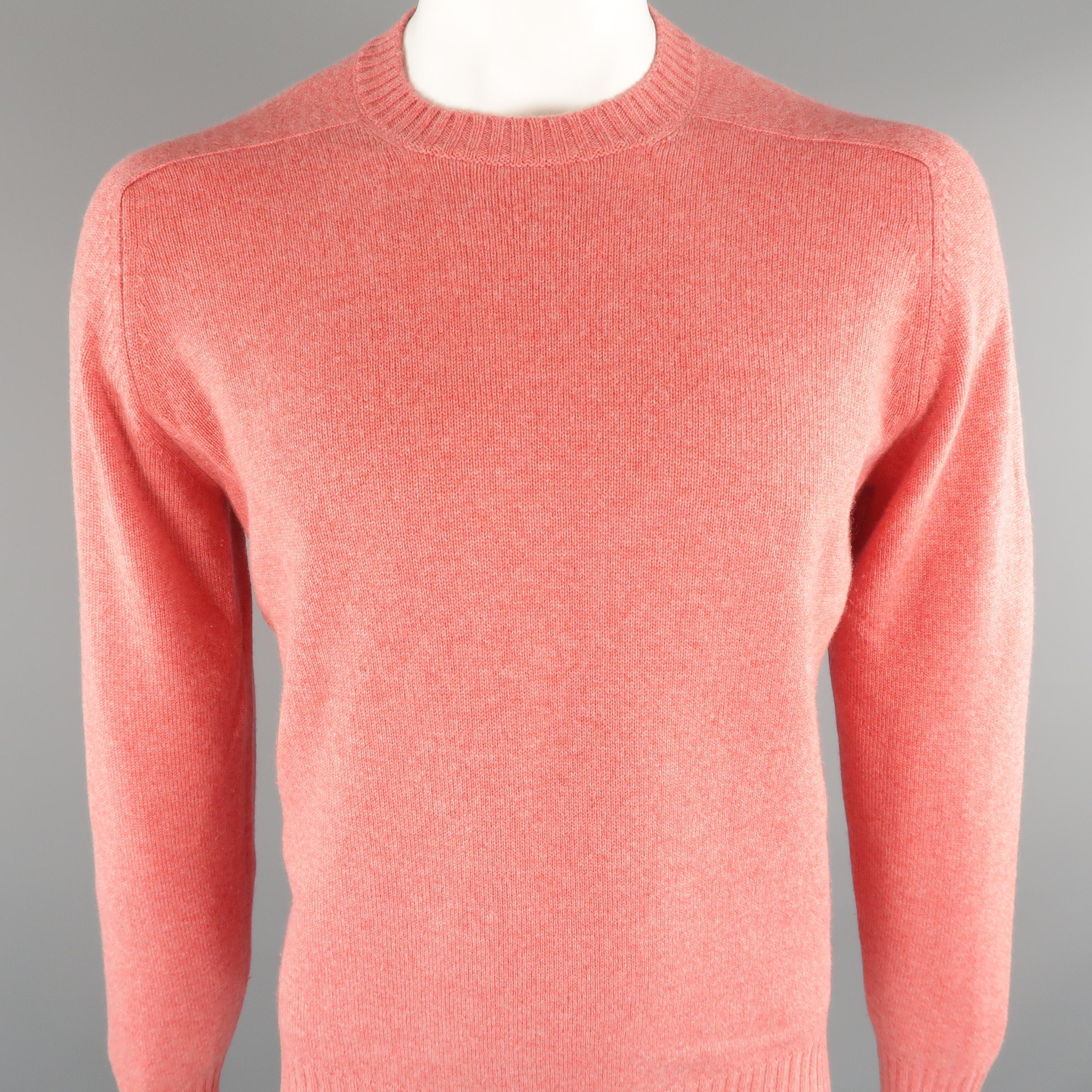 BRUNELLO CUCINELLI sweater comes in 100% cashmere, salmon tone, knited, with a crewneck and ribbed cuff and waistband. Made in Italy.
 
Excellent Pre-Owned Condition.
Marked: 52 IT
 
Measurements:
 
Shoulder: 18 in.
Chest: 46 in.
Sleeve: 27