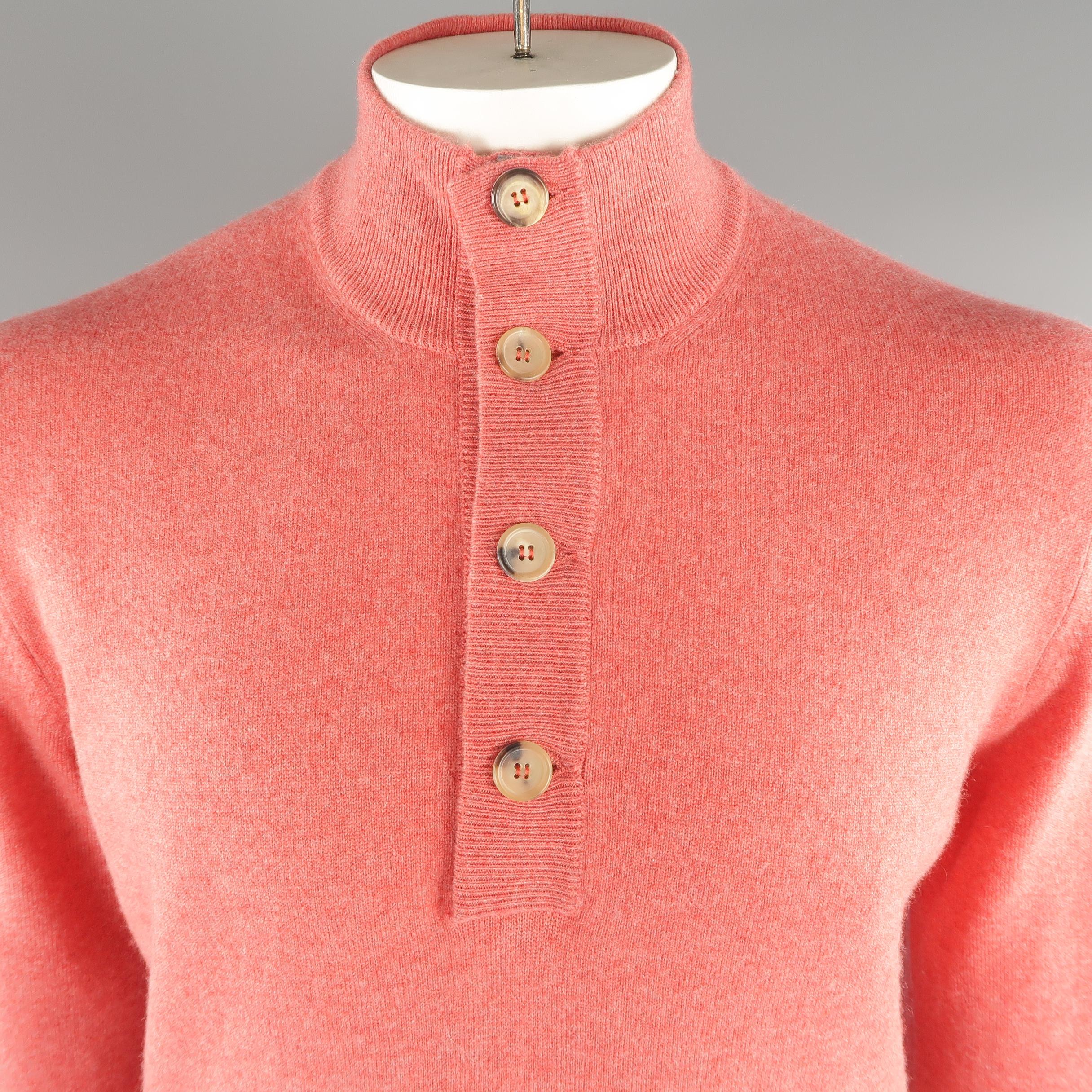 BRUNELLO CUCINELLI henley sweater come in 100% cashmere in a salmon tone, knitted, with front pockets, ribbed cuffs and waistband.  Made in Italy.
 
Excellent Pre-Owned Condition.
Marked: 52 IT
 
Measurements:
 
Shoulder: 18 in.
Chest: 44