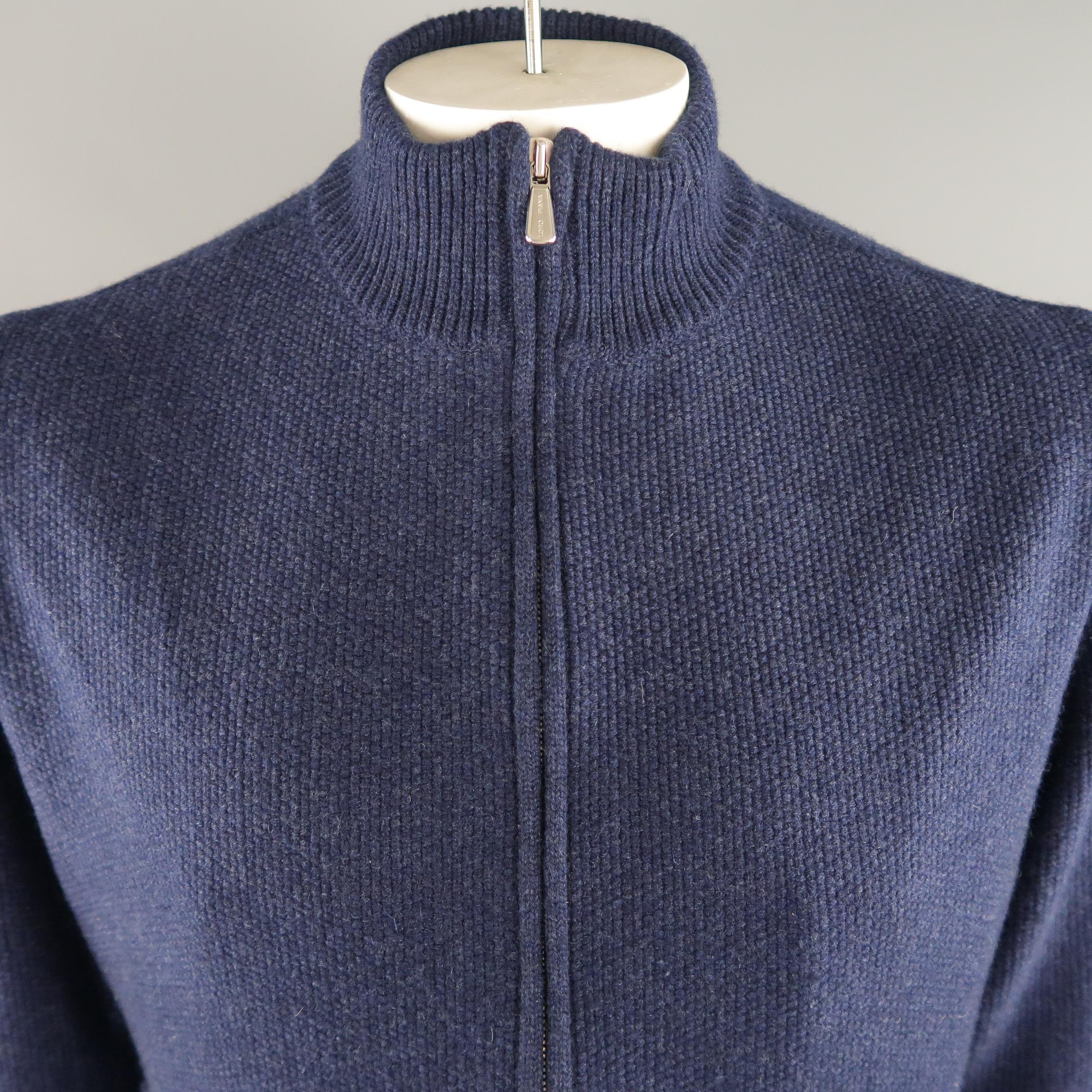 LORO PIANA jacket come in navy tone knitted cashmere material, with zip up front, front pockets, ribbed cuffs and waistband. Made in Italy.
 
New with Tags.
Marked: 54 IT
 
Measurements:
 
Shoulder: 19 in.
Chest: 49 in.
Sleeve: 26.5 in.
Length: 27