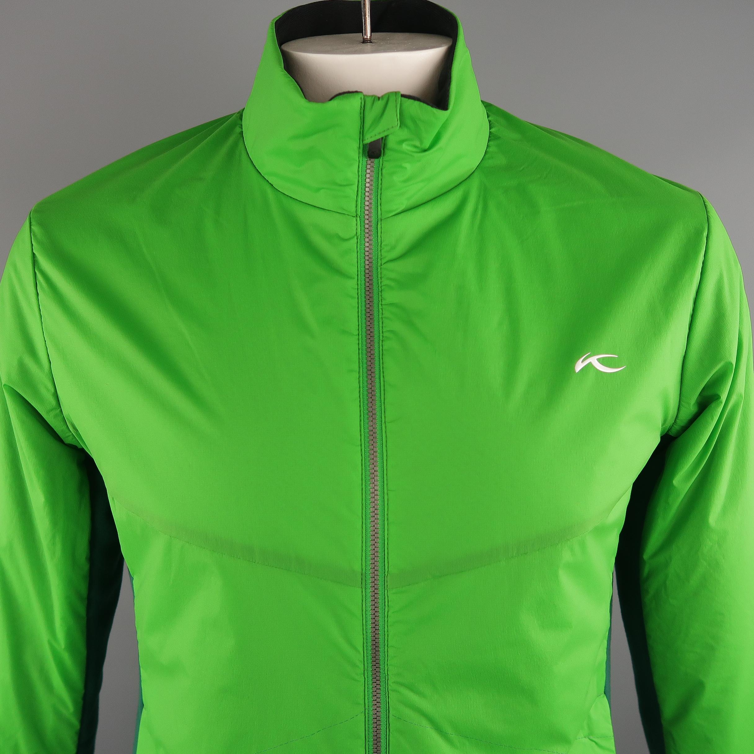 KJUS  jacket comes in a light weight green polyamide material and features a lateral elastane padding , zip up, slit pockets.
 
New with Tags.
Marked: 52 EU
 
Measurements:
 
Shoulder: 19 in.
Chest: 46 in.
Sleeve: 27.5 in.
Length: 29  in.
