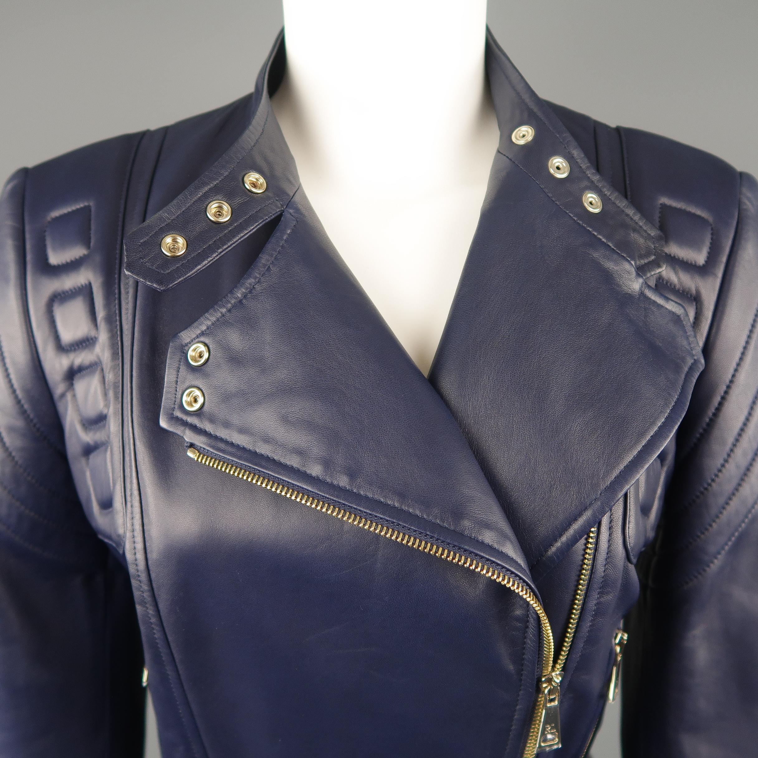RALPH LAUREN COLLECTION biker jacket comes in smooth navy blue lambskin leather with a snap band collar, double breasted asymmetrical zip closure, zip pockets and cuffs, side belts, and padded quilted shoulder details. Never worn. Hardware wrapped.