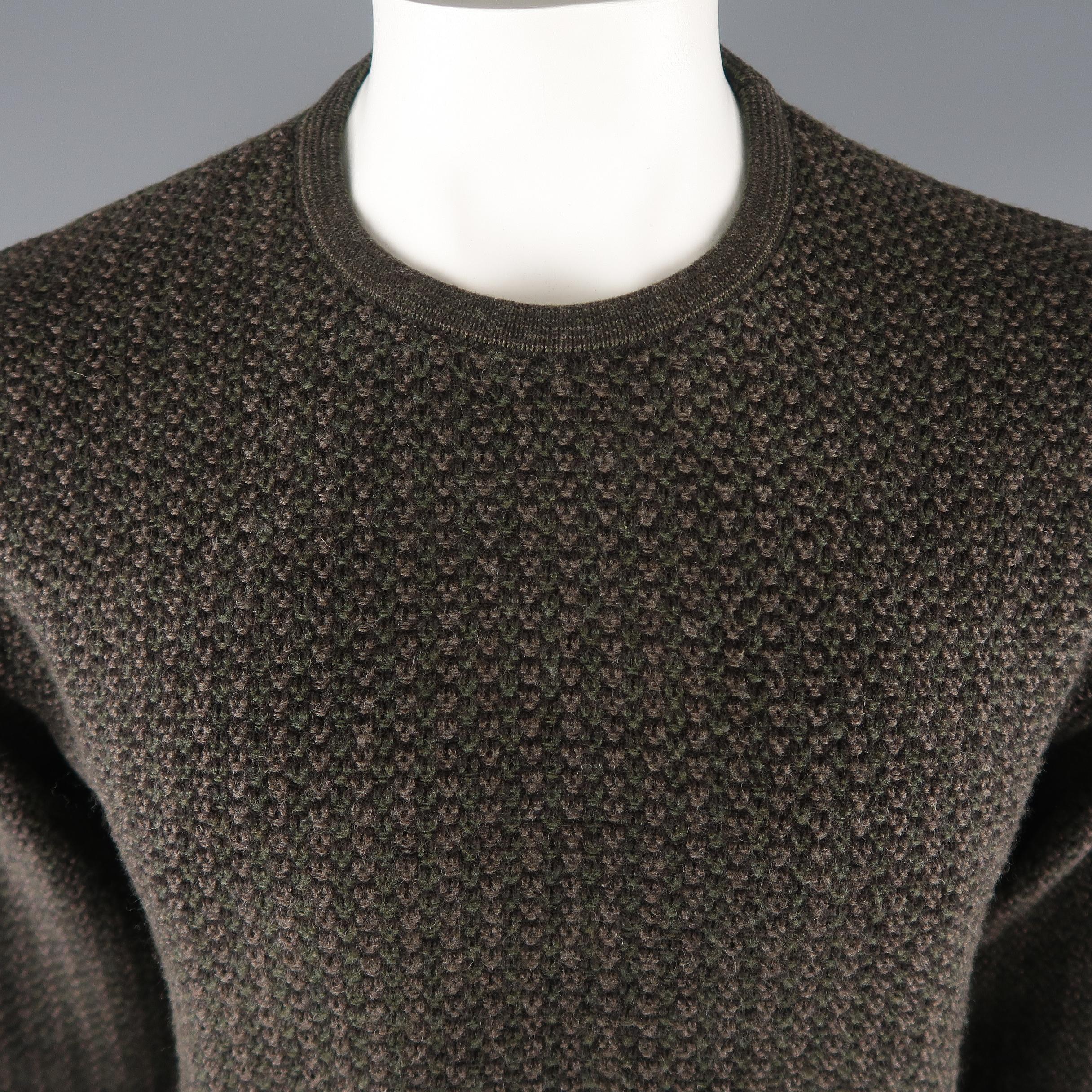 ERMENEGILDO ZEGNA sweater come in a  brown tone, knitted wool / cotton material, with a crewneck and ribbed cuff and waistband. Made in Italy.
 
Excellent Pre-Owned Condition.
Marked: L / 52 IT
 
Measurements:
 
Shoulder: 17 in.
Chest: 46
