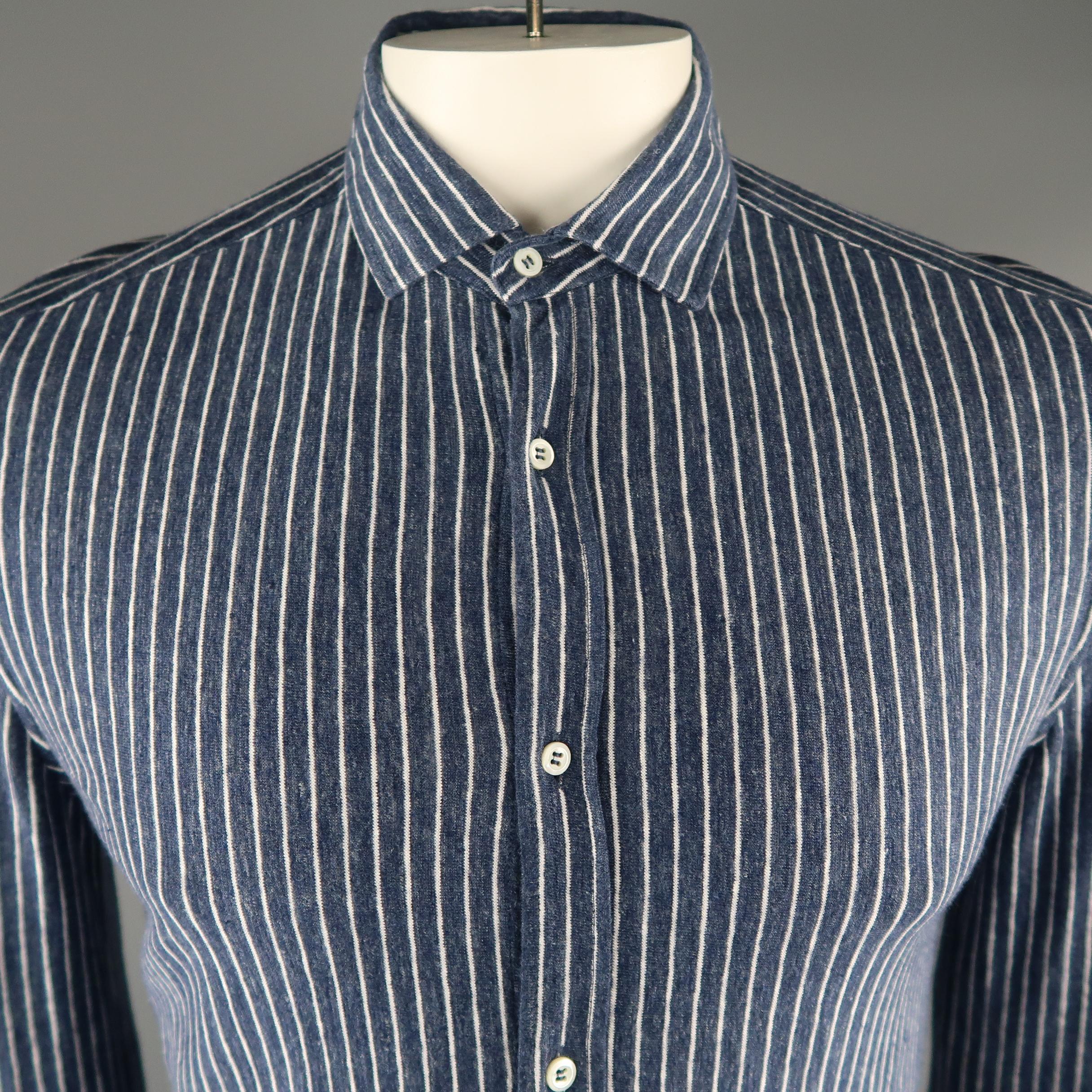 BRUNELLO CUCINELLI long sleeve shirt comes in navy and white striped linen blend, button-up. 

Made in Italy. 
Excellent Pre-Owned Condition.
Marked: L
 
Measurements:
 
Shoulder: 17.5 in.
Chest: 44 in.
Sleeve: 30 in.
Length: 30 in.