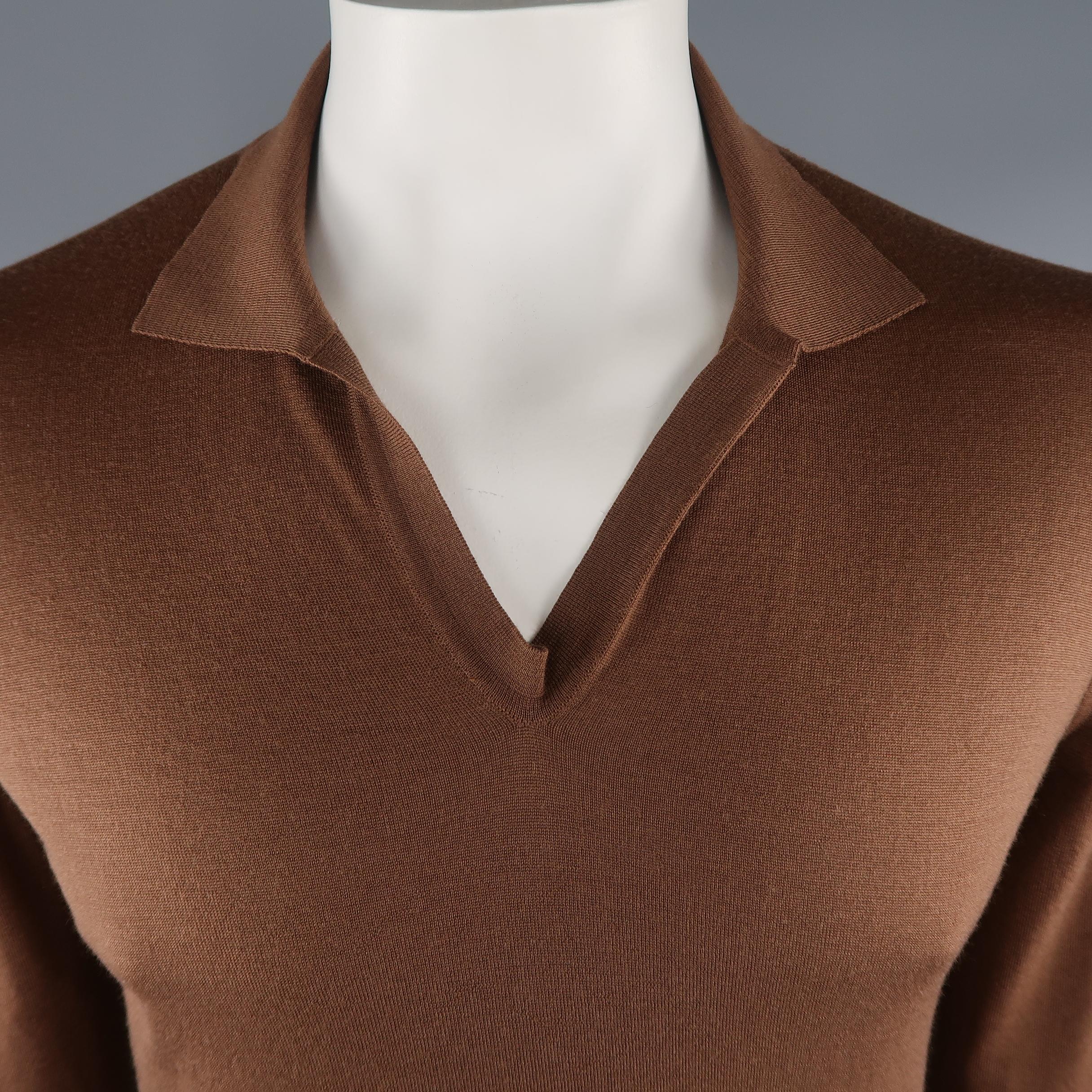 MAISON MARTIN MARGIELA pullover sweater come in brown solid wool, with open collar and ribbed cuff and hem. 

Made in Romania. 
Excellent Pre-Owned Condition.
Marked: size tag removed
 
Measurements:
 
Shoulder: 17 in.
Chest: 42 in.
Sleeve: 28.5