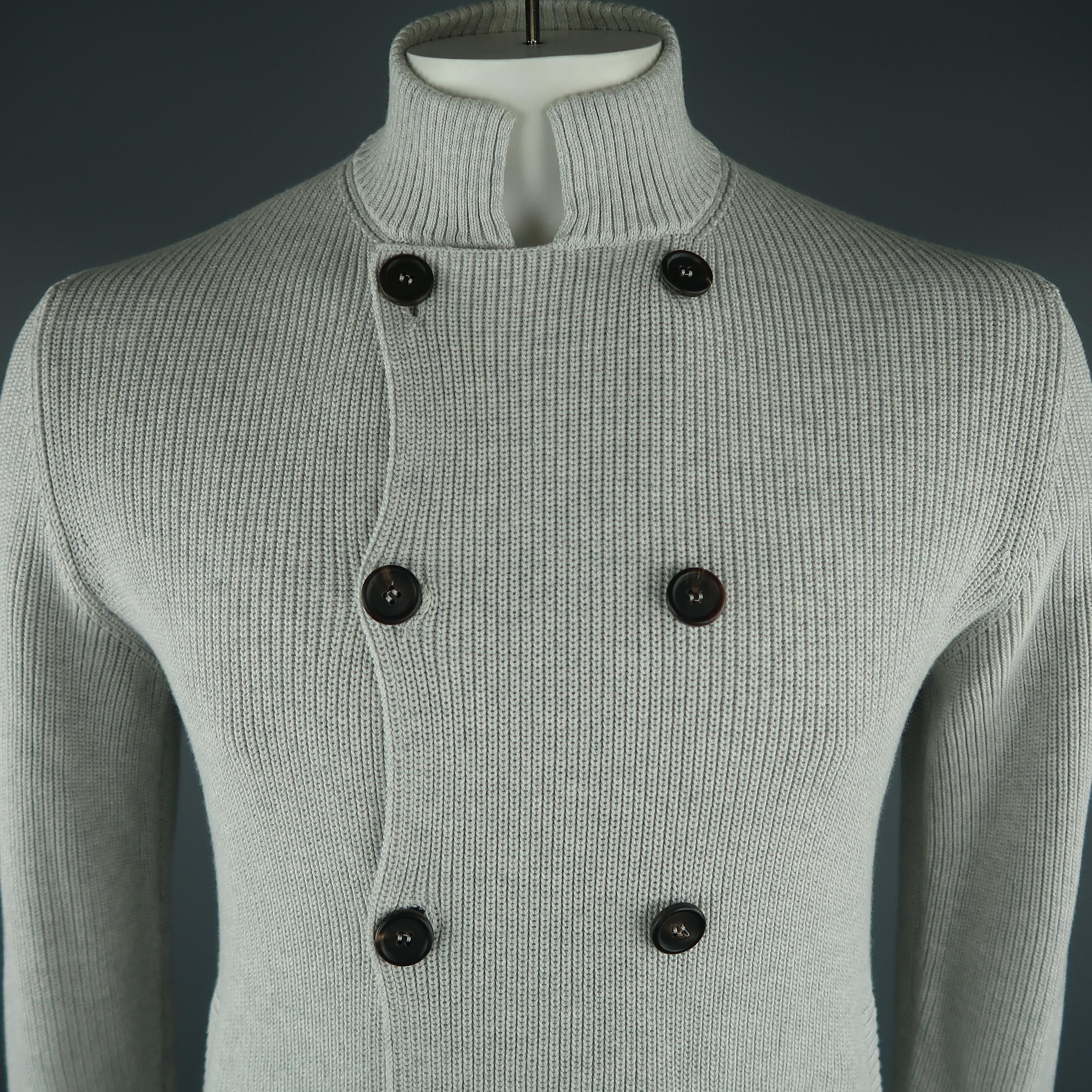 BRUNELLO CUCINELLI cardigan come in light grey knitted cotton, with front slit pockets, double breasted and stand collar. Made in Italy.
 
Excellent Pre-Owned Condition.
Marked: 52 IT
 
Measurements:
 
Shoulder: 16 in.
Chest: 40 in.
Sleeve: 28