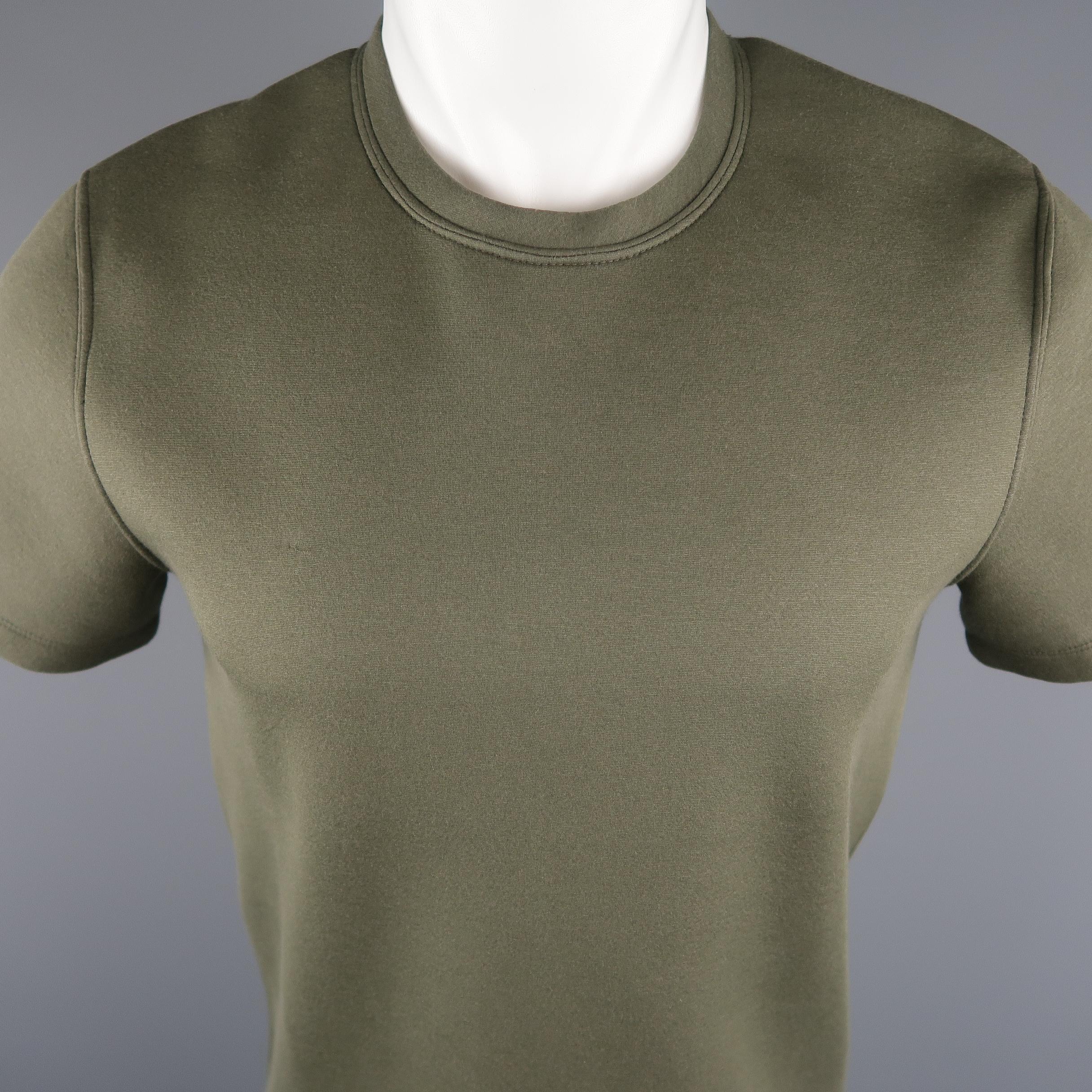 CALVIN KLEIN COLLECTION T-shirt comes in an olive solid cotton blend, with a crewneck and a detail on the shoulders. Made in Italy.
 
New with Tags.
Marked: S
 
Measurements:
 
Shoulder: 16 in.
Chest: 39 in.
Sleeve: 8 in.
Length: 25 in.