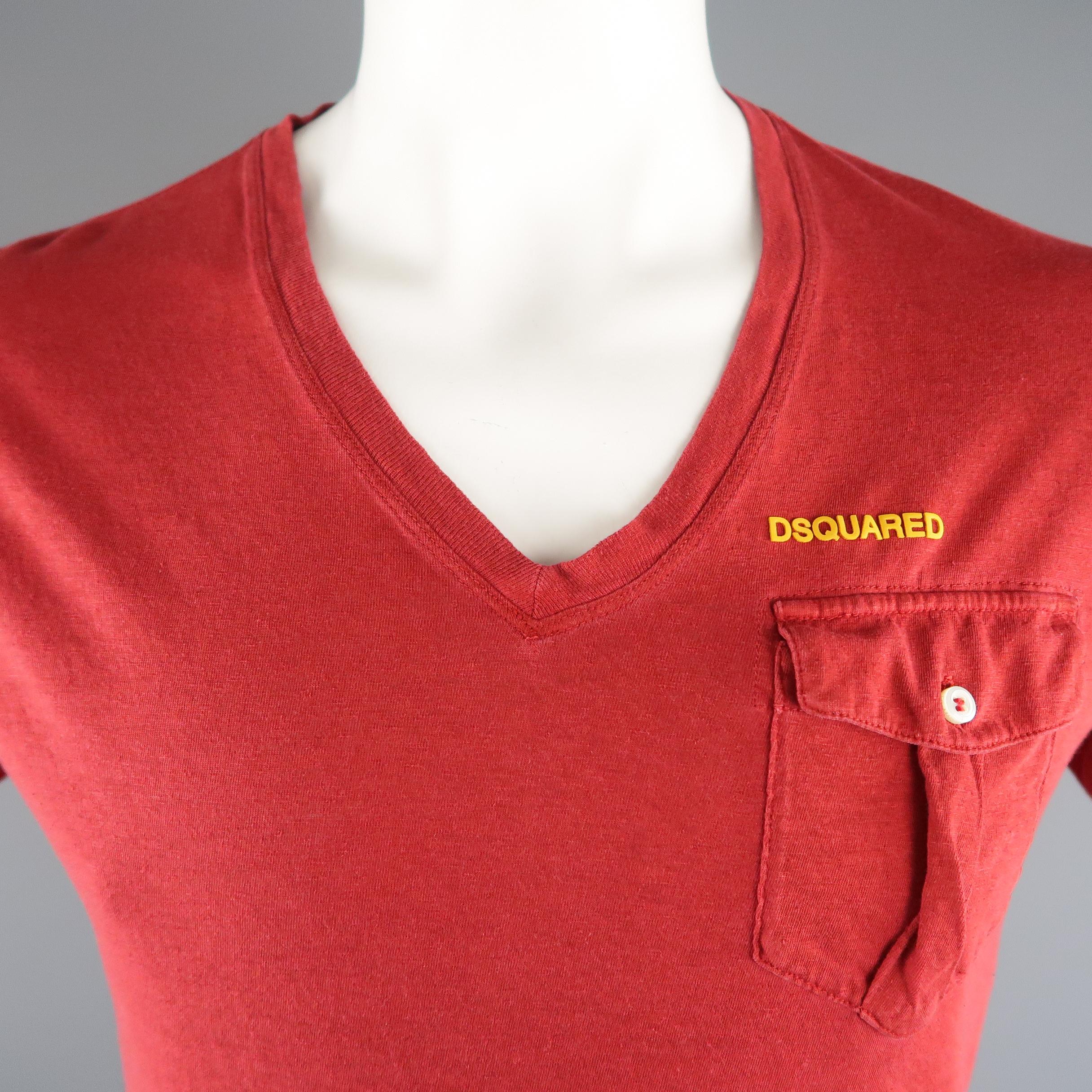 DSQUARED2 distressed T-shirt comes in a red solid cotton / linen material, with a V-neck, and a patch pocket. Made in Italy.
 
Excellent Pre-Owned Condition.
Marked: M
 
Measurements:
 
Shoulder: 17.5  in.  
Chest: 42  in.
Sleeve: 8.5  in.
Length: