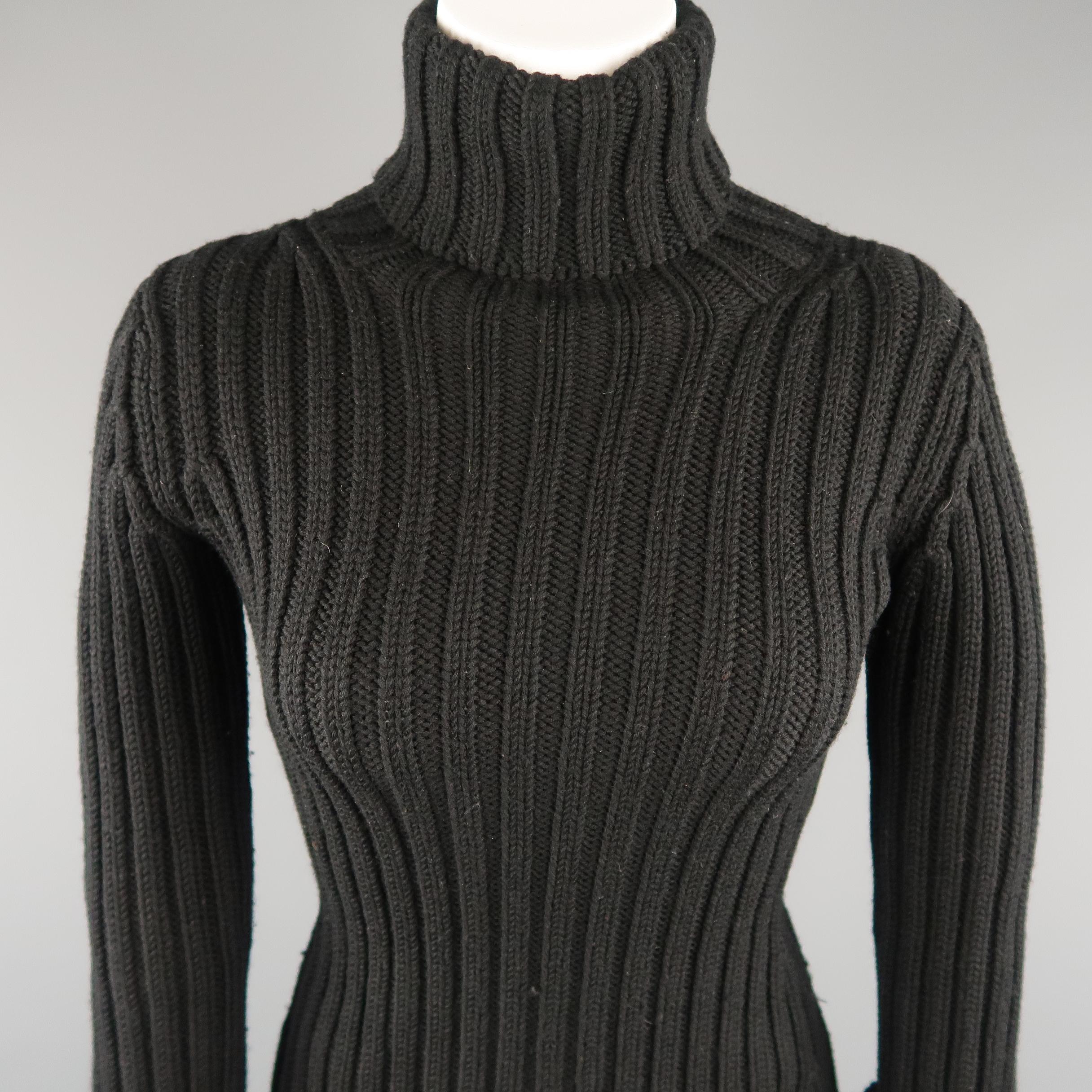 YOHJI YAMAMOTO turtleneck comes in ribbed wool knit with a folded high neck, fitted body, and cuffed sleeves.  Made in Japan.
 
Excellent Pre-Owned Condition.
Marked: JP 3
 
Measurements:
 
Shoulder: 15 in.
Bust: 32 in.
Sleeve: 26 in.
Length: 25 in.