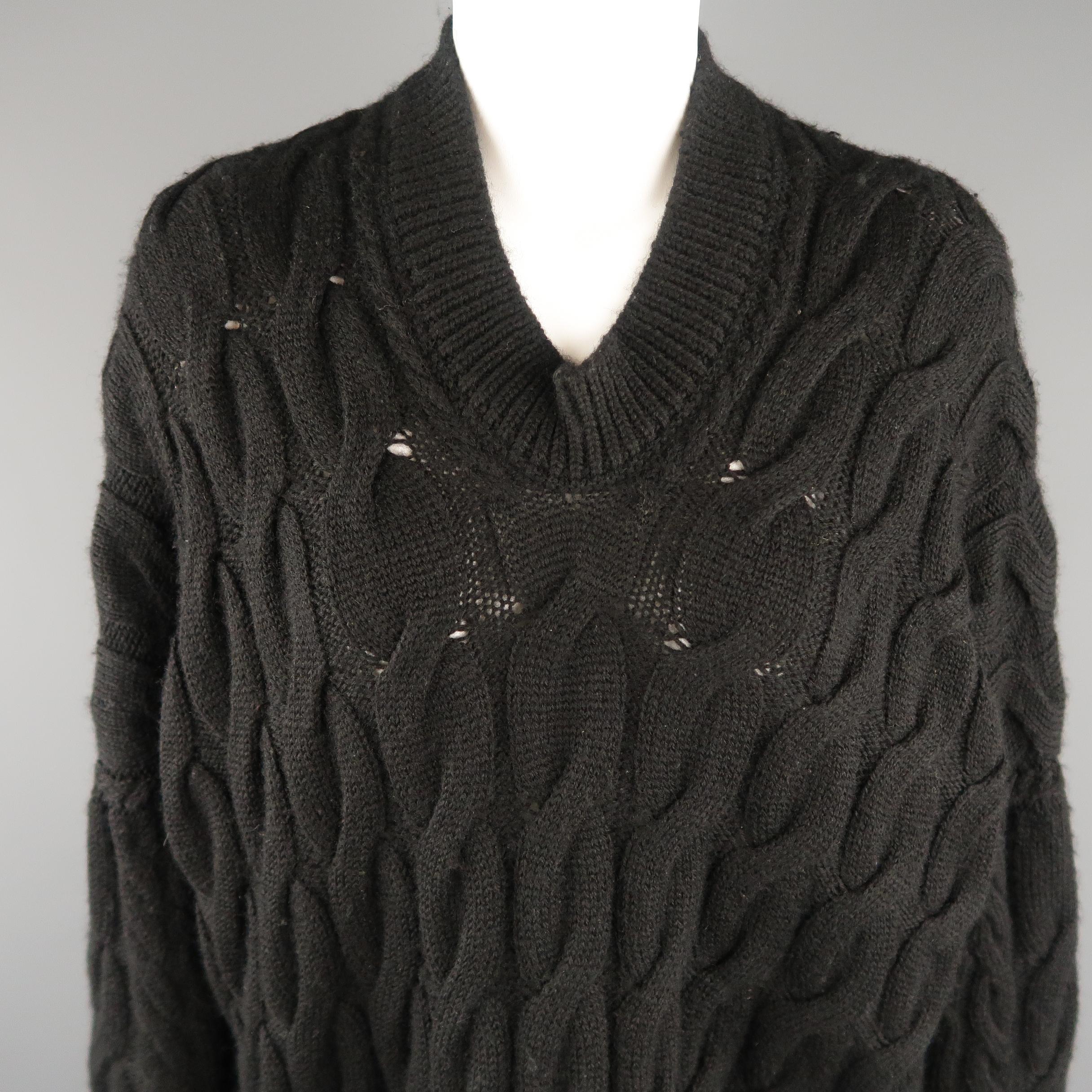 JUNYA WATANABE Comme des Garcons pullover sweater comes in black cable knit wool with an oversized fit, V neck, and drop shoulder. Made in Japan.
 
Good Pre-Owned Condition.
Marked: S
 
Measurements:
 
Shoulder: 34 in.
Bust: 52 in.
Sleeve: 19
