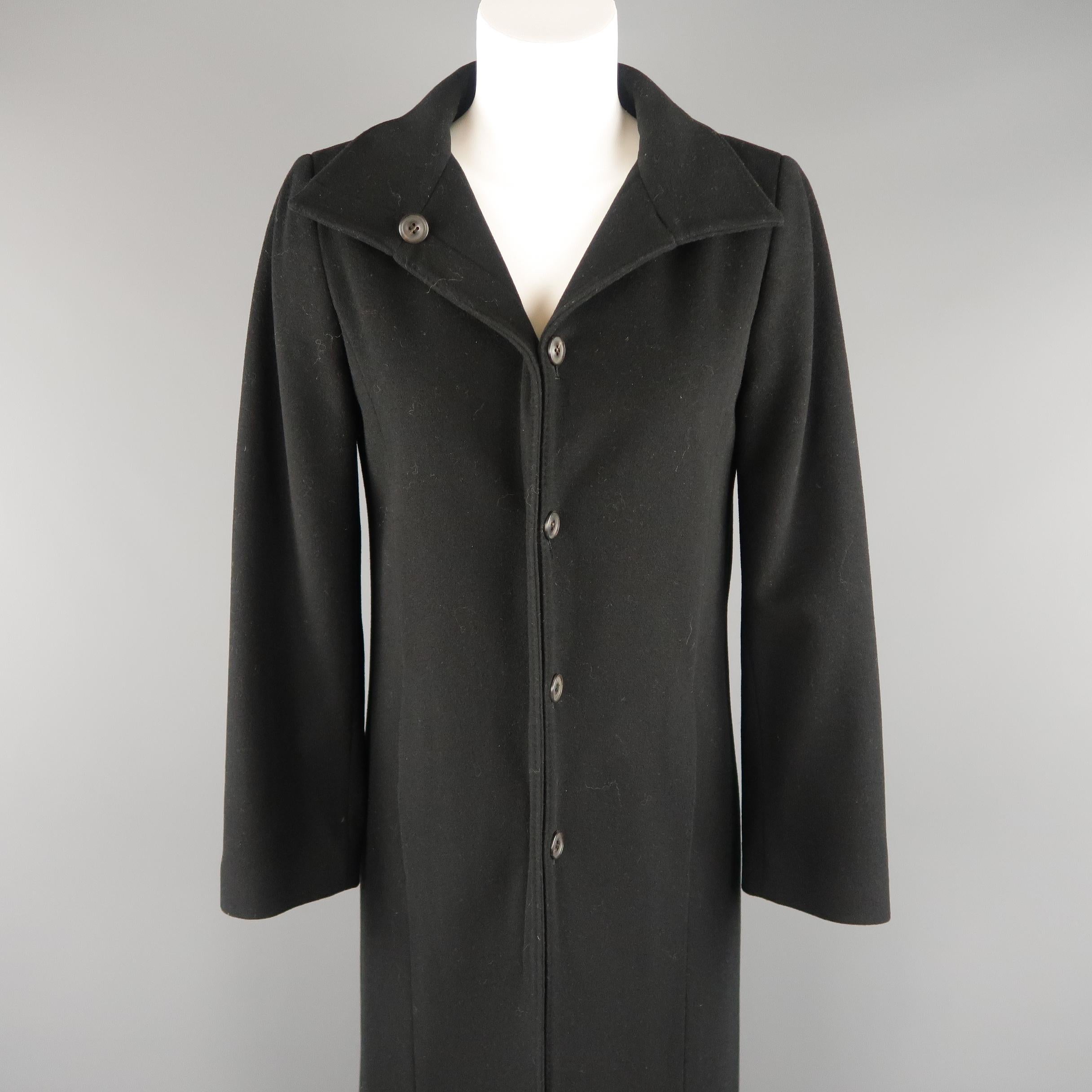 BARNEY'S NEW YORK coat comes in wool cashmere blend fabric with button in closure, slit pockets, and high back slit. Made in Italy.
 
Excellent Pre-Owned Condition.
Marked: 40 / 6
 
Measurements:
 
Shoulder: 15 in.
Bust: 38 in.
Waist: 36 in.
Hip: 40
